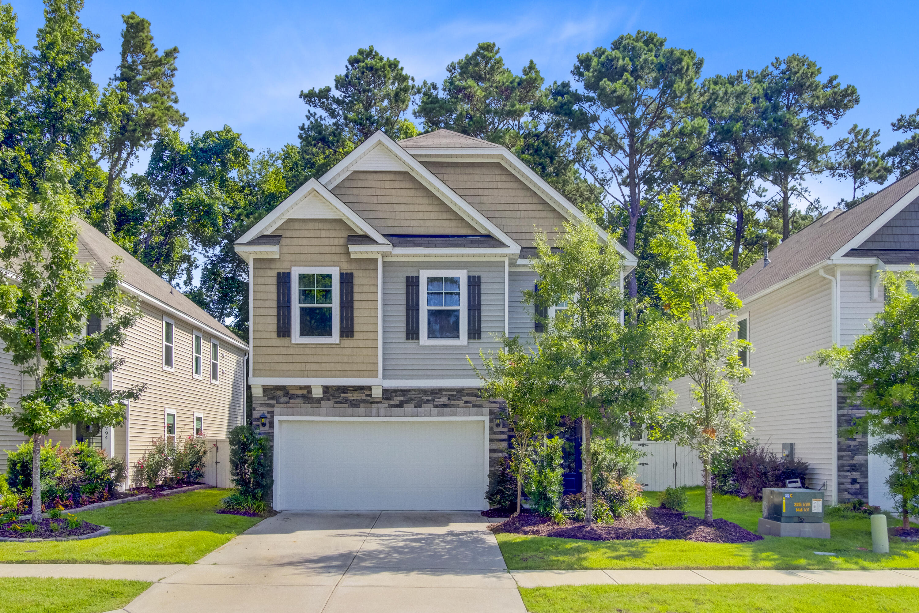 Welcome home! This beautiful home, built in 2020 with builder warranties still in place, is located in North Mt Pleasant in Bee's Crossing. The Robie floor plan, with almost 2,400 square feet, features 5 bedrooms (one bedroom is located downstairs) and 3 baths. The main level features luxury laminate flooring, guest bedroom/office with full bath and open living area. The kitchen is equipped with beautiful upgraded quartz countertops, updated lighting, high end stainless steel appliances, Samsung refrigerator with interchangeable covers, a new sink, upgraded oven hardware, plenty of storage and a large island, great for entertaining.Upstairs you will find the large primary bedroom with spacious walk in closet as well as the remaining bedrooms and laundry room.

The backyard is spacious with woods in the back - great privacy! 

The home is equipped with smart home technology as well as is fully fenced (permitted), tankless water heater, hurricane surge protector, new fan in screened in porch, updated landscaping and plenty of storage. 

Isle of Palms, Sullivan's Island and downtown Charleston are a short drive away. Located just down the street from Copahee Sound, residents can launch a kayak or enjoy fishing and crabbing as well as amazing views. Close to schools, library, hospital, shopping, restaurants, this is a home you don't want to miss!