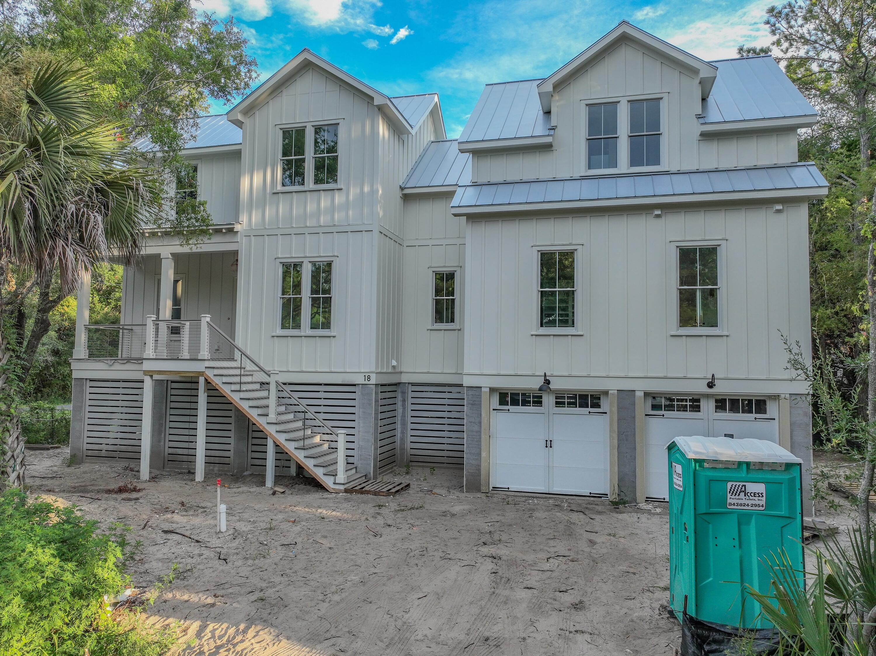 Introducing a brand-new custom-built home, expected to be completed in September 2025. This Custom Home with plenty of off-street parking just two blocks from the beach. Imagine unwinding by sinking your tired feet into the soft sands after a long day's work, just a short walk from your home or taking a Golf Cart Ride from your house to the vibrant Isle of Palms Recreation Center, where you'll have easy access to an array of exciting amenities. This IOP Recreation Center now features brand-new pickleball and basketball courts, tennis courts, baseball fields, and much more, guaranteeing endless opportunities for active recreation while you are enjoying your coastal lifestyle. This Luxury 6 Bedrooms, 5.5 Bathroom luxury residence features a custom in-ground gunite pool provides a privateoasis, while a dedicated built-in office caters to today's professional needs. Beyond the home's impressive heated square footage mentioned in the property listing, another 360 sq. ft. of flex space within the garage isn't included in the listed square footage which presents endless possibilities - a private gym, a secondary home office, a recreation room, or whatever your lifestyle demands. 

Step inside through the mahogany front door and be captivated by the awe-inspiring designer features and upgrades throughout. The grand foyer showcases floor-to-ceiling board and batten trim package adorned with elegant cove molding, stained wood accent ceiling and designer lighting, creating an ambiance of pure sophistication. Follow the engineered oak hardwood floors and trim paneling as they lead you to the open great room, promising an enchanting setting for both formal gatherings and relaxed living.

The great room seamlessly flows into the gourmet kitchen, a haven for culinary enthusiasts, featuring a chef's kitchen with a Dacor Appliance Package stainless steel gas stove, built-in Fridge and Freezer. Enjoy casual dining in the eat-in kitchen with plenty of natural light from the windows or hang around the oversized island that serves as a focal point, uniting style, and functionality. Also, on the main level is a dedicated separate office area, Full Laundry Room with drop-zone, a half bathroom, and an Owner's Suite on the Main Floor as well. 

The Owner's Suite features Board and Batten Trim paneling, a Full Bathroom with Raised Vanities, Stand-alone Tub, and a Zero-entry Shower with Frameless Glass enclosure. The owner's suite closet is a fashion enthusiast's dream, equipped with custom wood built-ins shelves capable of accommodating even a Hollywood movie star's wardrobe.
Upstairs each guest bathroom revel in the elegant tile adorning the bathrooms from the designers handpicked collection. Each Guest Bedroom upstairs have Hardwood Flooring through out, Ceiling Fan(s), and recessed canned LED lighting. Noteworthy features in this remarkable home include energy efficiency spray foam insulation in the subfloor and attic. The landscape package with irrigation complements the exterior, along with the paver driveway featuring a broom-swept concrete apron. Additional amenities include gutters, ensuring a seamless homeownership experience.

Book your exclusive showing today and request the coveted Designer Packet to fully grasp the array of luxurious features this home showcases. Seize the opportunity to transform this extraordinary property into your very own dream home. Don't let this chance slip away.