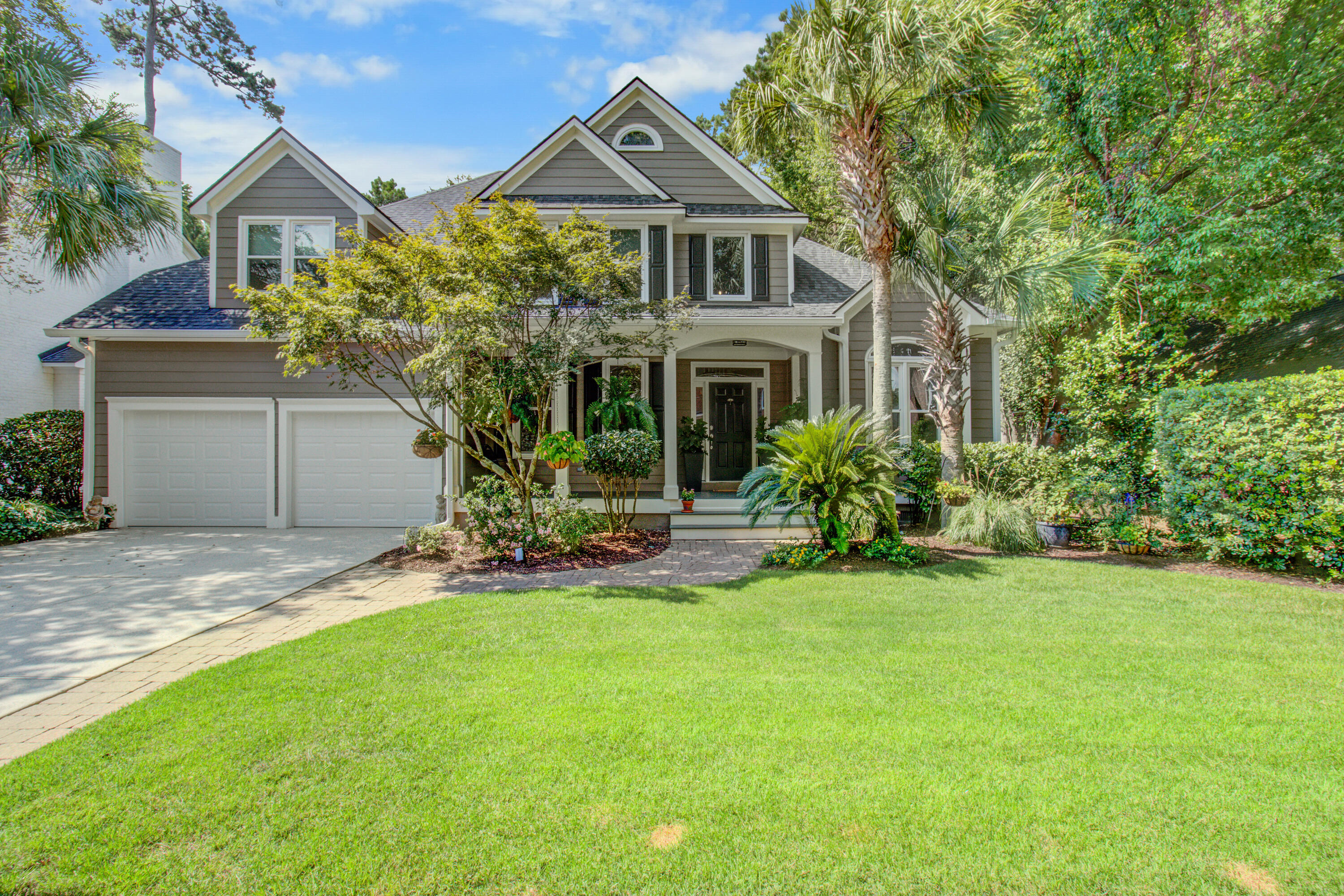 An Entertainer's Paradise with Impeccable Landscaping in Brickyard PlantationWelcome to 2716 Waterpointe Circle, a truly exceptional home where every detail has been thoughtfully updated and cared for over the last 26 years. This residence isn't just a house; it's a home that has been lovingly transformed into a private oasis, both inside and out. From the stunning, re-imagined landscaping to the updated interior and fantastic community amenities, this property offers a rare combination of comfort, privacy, and convenience. This home is a testament to what thoughtful design, care, and a wonderful location can create. The current owners hope the new owners will enjoy it as much as they have.Landscaping & Outdoor Oasis
The exterior of this home is a masterpiece of design and privacy. Both the front and back yards have been completely re-imagined with a meticulous eye for detail and year-round beauty.
The Front Yard is highlighted by a crepe myrtle surrounded by loropetulum at the new mailbox, creating a beautiful and welcoming entry. For added privacy, variegated pittosporum hedges line both sides of the front yard. A mature sago palm punctuates the curved pavers leading from the driveway to the front porch, while three palmetto palms and a Japanese maple add to the lush, lowcountry feel. An irrigation system was installed to ensure the entire yard remains vibrant, and a row of red repeat roses caps one of the hedges, adding a final touch of color.
The Backyard is a private sanctuary and a gardener's dream. A privacy berm is filled with camelias, azaleas, and agapanthus, providing a continuous burst of color throughout the year. Pavers in the back create a perfect spot for a fire pit or planters, while the raised back deck offers a prime location for dining and seating with a very private view of a lush land bufferno houses directly behind you. A generous screened-in back porch overlooks a large azalea bed that explodes with purple, white, and pink blooms each spring. The yard is a true bird sanctuary, complete with feeders and a bird bath, and is detailed with a large ligustrum privacy hedge, sunshine ligustrum, and a long run of yellow African iris that connects to the berm via a mature river birch tree.
 
Interior Highlights & Upgrades
This home offers a wonderful, open floor plan that flows effortlessly, making it an ideal space for both everyday living and entertaining.
"	Open Floor Plan: The layout is designed for modern living, with an open flow between the main living spaces. The updated kitchen is a fantastic gathering spot, opening directly to the family room.
"	Updated Kitchen: The kitchen has been completely updated and brightened with new features. It boasts coordinated tile flooring, soft close cabinets, and quartz counters with an oyster motif. Distinctive lighting, including an oyster chandelier over the breakfast table, enhances the space. A large picture window in the breakfast area provides a wonderful view of the serene backyard.
"	Downstairs Master Suite: The spacious master bedroom is located on the main floor, offering convenience and privacy. It has been updated and is a peaceful retreat.
"	Dining Room: The separate dining room is the perfect spot for family dinners and holiday gatherings. 
"	Study/Office: To the right of the foyer is an ideal space for your study or office. Removed enough from the main living space so you can have all the privacy you need for an ideal home office. 
"	Flexible Spaces: The home includes three generous bedrooms upstairs, with the fourth bedroom over the garage (FROG) that the current owner has enjoyed as a "man cave," highlighting its versatility. The screened-in back porch is a favorite spot for relaxing with a book and coffee.
"	Recent Improvements: The home has a brand-new roof and gutter system, and the HVAC units are less than seven years old and have been meticulously maintained. Other key upgrades include a dehumidifier with an interior monitoring station and green energy windows installed seven years ago.
 
Community & Location
Living in Brickyard Plantation is a lifestyle in of itself. The neighborhood is quiet, the residents are respectful, and the common areas are beautifully maintained. The amenities are second to none:
"	Two community pools
"	Five lighted tennis courts
"	Basketball and soccer fields
"	A fully equipped fitness room
"	A private boat ramp and storage
"	Miles of walking and biking trails
This home is perfectly situated with excellent proximity to a wide array of dining, grocery stores, gas stations, banks, and shopping, making daily errands and entertainment a breeze.


Work done in last 60 days to prep for sale
-Painting: interior doors and baseboards, garage
-Soft Wash house and porches, pressure wash driveway & pavers
-Tile & counter regrout, cleaning throughout home
-Brand new roof with transferable warranty
-Brand new gutter system
-Upstairs carpet cleaned
-Installed new GFCI outlets (inside and outside) 
-Replaced mailbox and post to Brickyard HOA specifications

Upgrades and Improvements Made During Sellers Ownership

Landscaping Updates

-Irrigation system installed
-Complete & Extensive Landscaping Overhaul (Front and Back)
		-Crepe Myrtle surrounded by Loropetalum at new mailbox
-Variegated Pittosporum Hedges on both sides of front yard for privacy
-Mature Sago Palm punctuates curved pavers to porch from driveway
-Three Palmetto Palms added to front yard.
-Japanese Maple added to front of porch area. 
-Red Repeat Roses capping one of the hedges to the road. 
-Installed back privacy berm with Camelias, Azaleas and Agapanthus. 
-Pavers in back to create a space for a fire pit or planter in the summer months
-Raised back deck to provide dining and seating to enjoy very private view of land      buffer (no houses behind!)
-Large Azalea bed with purple, white and pink blooms in the spring. 
-Large Ligustrum Privacy Hedge with Sunshine Ligustrum
-A long run of African Iris connecting to the berm via a mature River Birch Tree

Kitchen Updates

-Quartz Counters (Oyster motif)
-Cabinets had soft close installed
-Subway tile backsplash installed
-Ceramic tile flooring
-Lighting change to can lights and increased number
-Under cabinets lighting installed
-Currey & Company Oyster Chandelier in breakfast area
-Replaced all doors with lever handles





Bathroom Updates

Master Bathroom totally reimagined
-New Tub
-Wainscoting surround
-New paint color
-Quartz counters
-New sinks & fixtures
-New custom cabinets, including cabinet above toilet
-Shower enlarged and tiled with new fixtures
-"Smart" exhaust fan
-Currey & Company Chandelier
-Tile floor
-Illuminated mirrors
-New Toto brand toilet

Upstairs Full Bathroom - extensive renovation
-Tile flooring
-New custom cabinets
-New sinks & fixtures
-Changed to ceiling can lighting
-Illuminated mirrors
-Quartz counters
-Larger shower area - tiled & new fixtures
-New Toto brand toilet

Half Bath (downstairs hallway)
-Tile wall
-New Mirror
-Sink (oversized)
-Quartz counter
-Sink and towel fixtures
-Under counter lighting
-Custom wall lighting
-New Toto brand toilet

Misc Updates
	-Installed dehumidifier (new unit installed 2020) and sealed crawlspace. 
-Electronic monitor inside home to monitor humidity.
-Exterior and Interior completely repainted
-Windows Replaced
	-Simonton Green Energy with transferable warranty
-Upstairs HVAC replaced in 2018 (service contract with Carney & Sons 72 Degrees
-New garage opener system and insulated doors installed (2020)
-Downstairs HVAC replaced (2020)
 	-New custom front door knocker and bell button