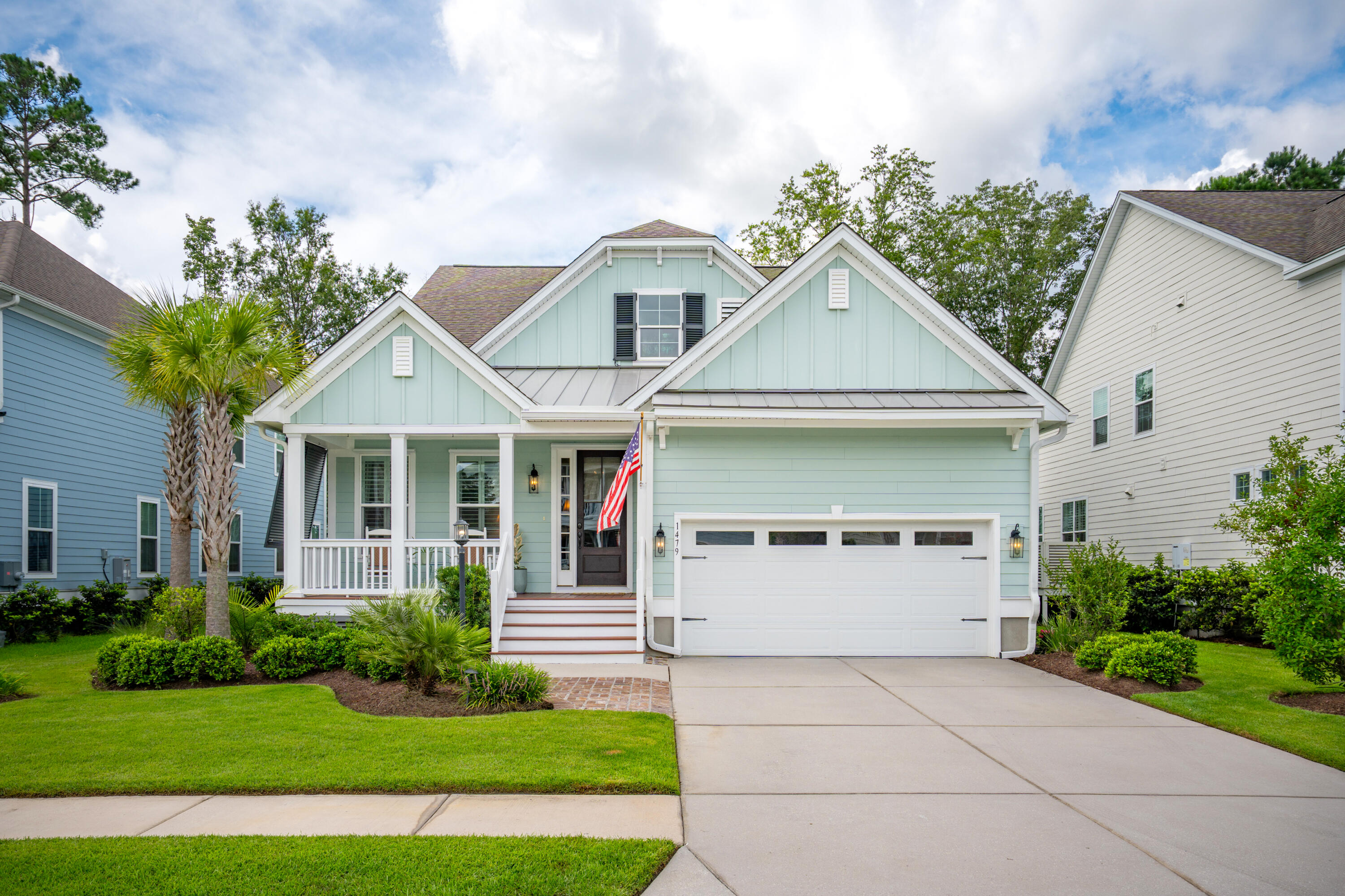 Welcome to this stunning, move-in-ready home located in the highly sought-after Covington section of Park West. This beautifully maintained residence offers exceptional curb appeal and a thoughtfully designed floor plan, perfect for both everyday living and entertaining. Step inside to discover an open-concept layout featuring a gourmet chef's kitchen with light grey cabinetry, stainless steel appliances, a spacious center island with a farmhouse sink, and elegant quartz countertops. The kitchen seamlessly flows into the inviting family room, complete with a cozy gas fireplace and direct access to the screened-in porch - ideal for indoor-outdoor living. The main-level primary suite is a serene retreat, boasting a generous walk-in closet and a luxurious en suite bath with dual vanities, a soaking tub and a large, tiled shower. Also on the main floor, you'll find a private home office, a convenient laundry room and a stylish powder room. Upstairs, enjoy a large bonus room, three additional well-appointed bedrooms and a full bathroom - offering plenty of space for family, guests, or hobbies. A spacious walk-in attic provides excellent storage options and the potential to add an additional bathroom if desired.
The screened-in porch features Bermuda shutters for added privacy and overlooks a professionally landscaped yard - perfect for relaxing or entertaining. Additional highlights include an encapsulated crawl space with a dehumidifier for year-round comfort, hurricane shutters, landscape lighting, and an X flood zone designation, meaning no flood insurance is required. Don't miss the opportunity to own this exceptional home in one of Mount Pleasant's premier communities.