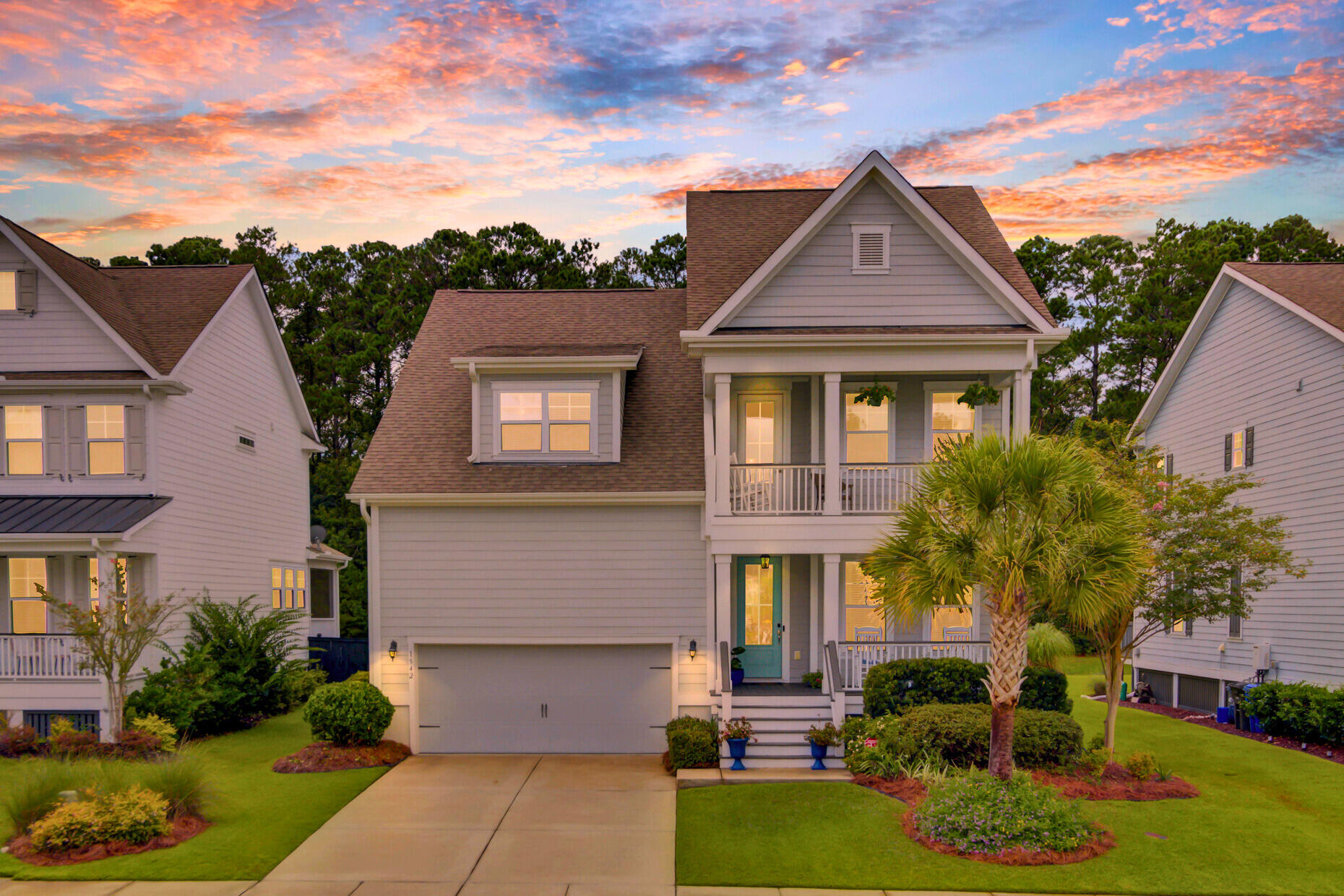 Charleston-style double porches welcome you into this beautiful 2-story home with a private first-floor primary suite located in the heart of Park West. Off the foyer is a dedicated office, followed by a well-appointed kitchen with a large island, stainless steel appliances, and a dining area that flows into the family room with vaulted ceilings and a gas fireplace. The brand-new primary bath is a showpiece, offering an oversized walk-in shower, double vanities with quartz countertops, and a spacious walk-in closet. A convenient laundry and powder room completes the first floor.Hardwood stairs lead to a loft with access to the second-story porch, the perfect spot to enjoy a sunrise. Two bedrooms share a full bathroom, while a fourth bedroom has its own private en-suite.The screened-in porch and custom patio create a wonderful space for entertaining while overlooking a beautifully landscaped backyard with pond and wooded views owned by the POA. 

Park West offers resort-style amenities including two pools, tennis and pickleball courts, a playground, and miles of walking trails, all just a five-minute walk away. This home also features an irrigation system, hurricane shields, Hardie Plank exterior, dual-zone 14 Seer Carrier HVAC with a high-efficiency gas furnace, a Rinnai tankless water heater, radiant barrier in the attic, and crown molding in the main living areas and primary suite. Shaw hardwood flooring runs throughout the main living areas, and the kitchen is equipped with stainless steel appliances, including a cooktop, microwave, wall oven, refrigerator, and dishwasher. Also included are the washer and dryer.

Located in an X flood zone where flood insurance is not required, this home is conveniently close to top-rated schools, Laurel Hill, Cario, Wando, and Oceanside schools, as well as grocery stores, restaurants, Roper St. Francis Hospital, and is only 15 minutes from the beach.