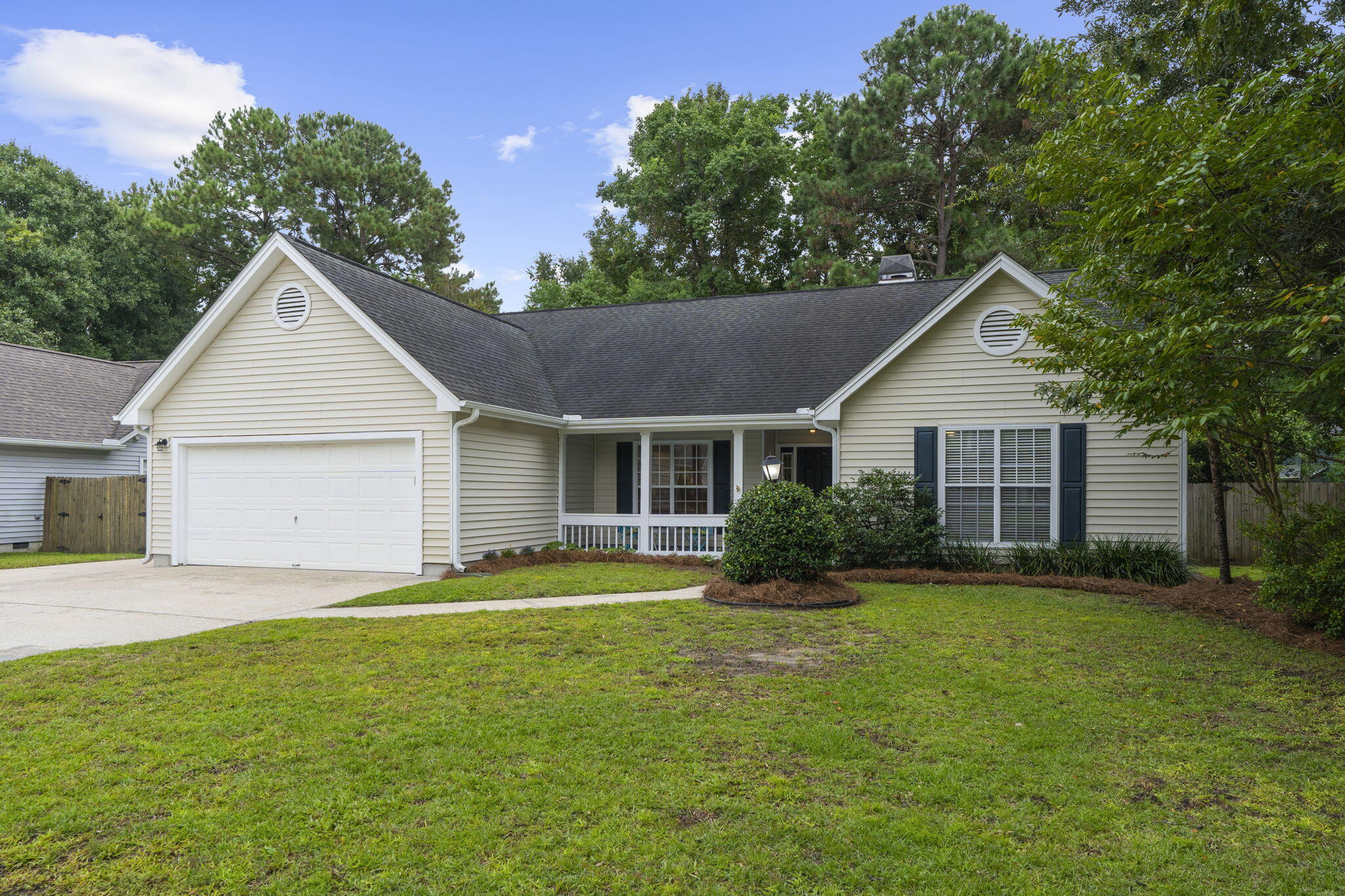 Beautifully renovated 4BR/2BA ranch with 2,034 sq ft all on one level. Features include a gourmet kitchen with high-end appliances and custom cabinets.  Pot filler, glass front cabinets and storage space under island.  Fresh paint, laminate flooring in living areas, and new carpet in bedrooms. Flexible home office or formal dining room. Heated/cooled sunroom and large screened porch. Spacious 2-car garage plus paved parking/storage pad. Private fenced backyard with mature landscaping, fig tree, raised garden beds, outdoor shower, deck, and firepit. Brand new HVAC (2025). Prime location minutes to Belle Hall, I-526, Hwy 17, and walk/bike access to Snee Farm amenities.This move-in ready ranch offers the perfect blend of indoor comfort and outdoor living, with plenty of space to relax, entertain, and enjoy the Lowcountry lifestyle.