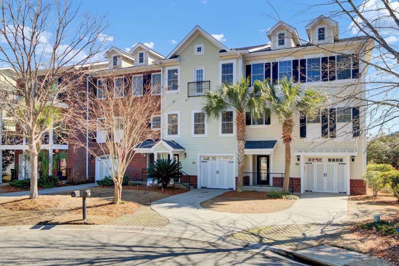 Welcome to Etiwan Pointe, a highly sought after community in Mt. Pleasant. This beautiful townhome features a functional, open concept floor plan across three levels of living. Hardwood floors flow throughout the main living areas, complementing the spacious kitchen with a large pantry. The main floor also includes a private bedroom with an en-suite bath, a bright living room, and a screened-in porch with peaceful pond views. On the upper level, the primary bedroom serves as a private retreat, offering a large walk-in closet and an en-suite bath with dual sinks, a luxurious whirlpool tub, and a step-in shower. Another bedroom with its own en-suite bath, the laundry area, and additional storage complete this floor. The ground level features.....a spacious foyer, additional storage, a very large two-to-three-car garage, and an outdoor patio perfect for entertaining. This home has peeks of the Ashley River waterfront and is conveniently located directly across from the neighborhood's amenities, which includes a clubhouse, gym, pool, walking trail, and a private deep-water dock with access to the Ashley River. The monthly HOA fees cover grounds maintenance, lawn care, annual pressure washing, external home insurance, and a termite bond. This location provides easy access to I-526, Downtown Charleston, the beach, great schools, shopping centers, restaurants, and much more. Recent Updates include lighting, fixtures, HVAC, smart thermostat, new window, fresh paint, and newer roof (2019).