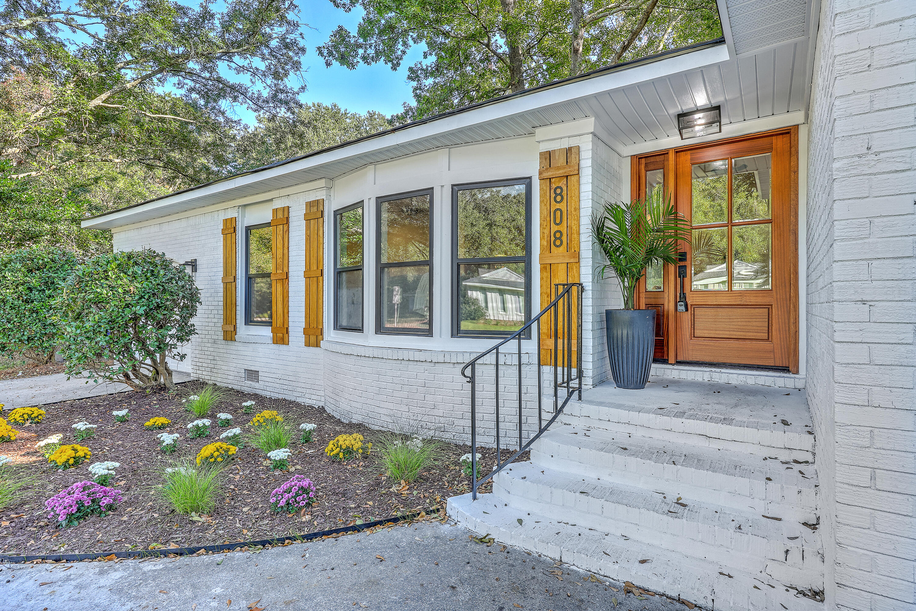 Welcome to 808 O'Sullivan Drive, a beautifully renovated home in the heart of Mount Pleasant, SC. This 3-bedroom, 2-bath residence with a versatile finished room over the garage (FROG) offers 1,866 square feet of thoughtfully designed living space. Whether used as a bonus office, playroom, or a fourth bedroom, the FROG adds flexibility to suit your lifestyle. Located just off Mathis Ferry and Bowman Road, this home provides quick access to I-526 and is surrounded by popular dining spots like Kairos Mediterranean, Five Loaves Cafe, Chick-fil-A, and McDonald's.Step inside to discover real hardwood floors and a brand-new open floor plan that seamlessly connects the living, dining, and kitchen areas. The kitchen is a showstopper, featuring new cabinets, quartz countertops,and modern appliances. Both bathrooms have been updated with stylish new tile, plumbing, and electrical fixtures. The home also boasts new lighting, hardware, windows, doorsincluding new exterior entry doorsand a complete trim and drywall package that gives every room a fresh, polished feel.

Additional upgrades include a new HVAC duct system for efficient climate control and a spacious backyard perfect for entertaining, gardening, or relaxing in the Lowcountry sunshine. A one-car garage adds convenience and storage. With its prime location, extensive renovations, and flexible layout, 808 O'Sullivan Drive is a rare find in one of Mount Pleasant's most desirable neighborhoods.