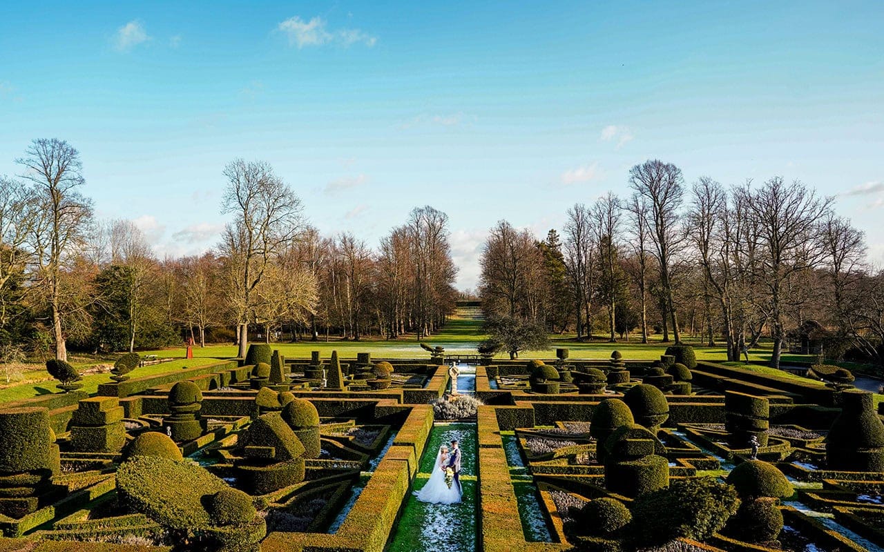 The maze gardens at Great Fosters Hotel on a wedding day