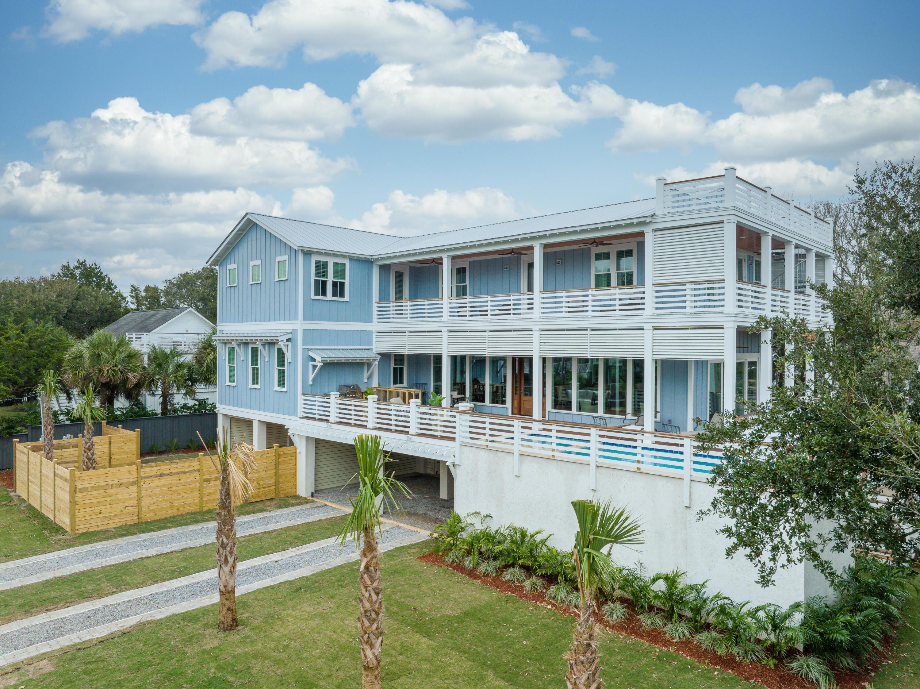 This six bedroom second row home is a must see for anyone looking for a vacation home, primary residence, or vacation rental.  The home features white oak wide plank flooring, quartz countertops, gourmet kitchen with Dacor Appliances, tile zero entry showers with glass enclosures, cast iron clawfoot tub in master, outdoor kitchen and bar area on a huge wrap around deck, 22' corner set elevated heated pool with built in spa and waterfall, two tankless hot water heaters, elevator to all floors, butlers pantry and two gas fireplaces.  The home is trimmed with 6'' cove molding and 10'' baseboards and is accented by ship lap siding. Vacation rental projections will be available by Dec 1.