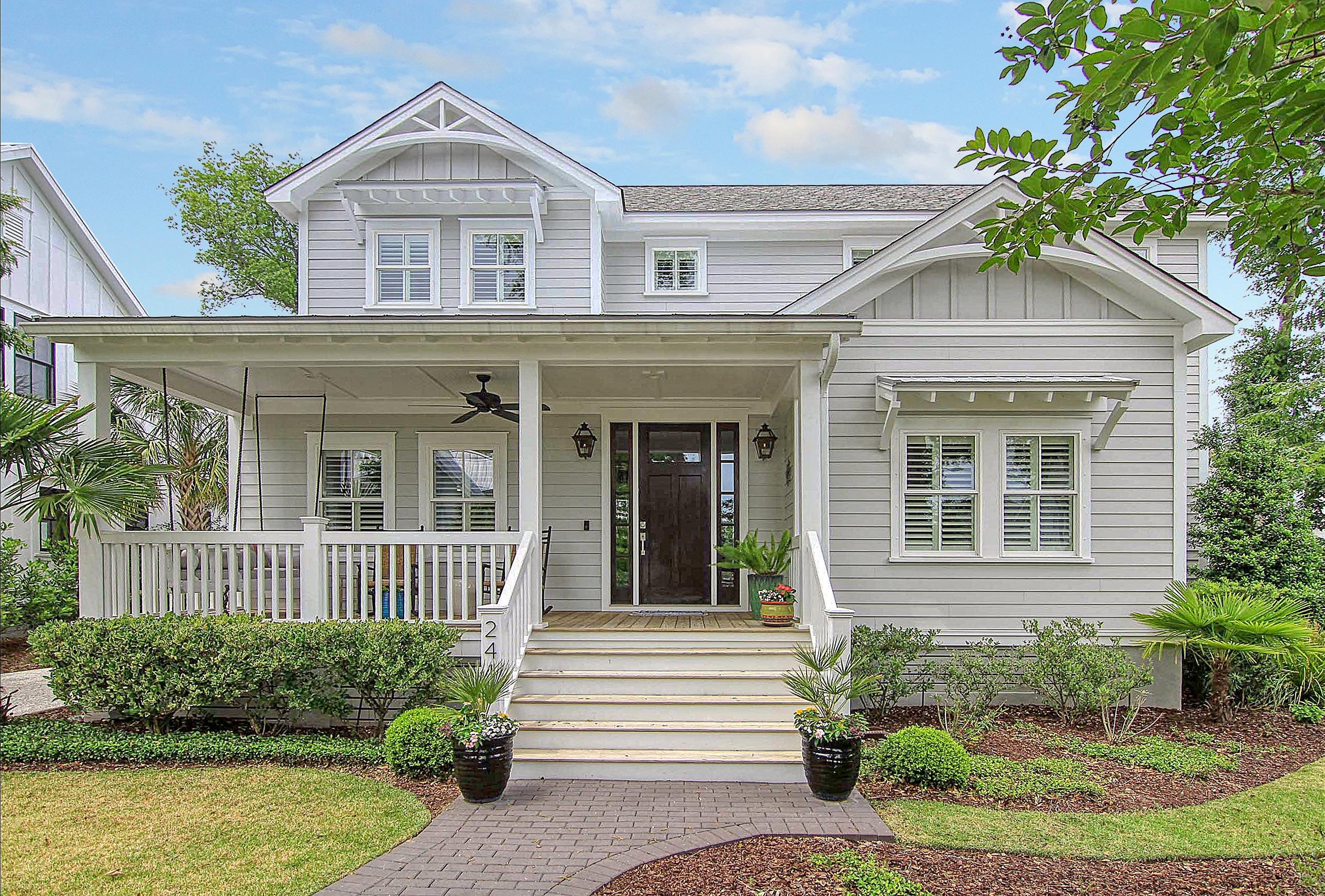 Located on the Ralston Grove side of Daniel Creek, this charming coastal home boasts an array of delightful features. As you step inside, you'll immediately notice the inviting hardwood floors, high ceilings, and an open floor plan that seamlessly connects the kitchen and living room. The living room is enhanced by a cozy fireplace flanked by built-in shelving, creating a warm and inviting ambiance. Exposed wood beams adorn the ceiling, adding a touch of rustic elegance.The chef's kitchen is a true masterpiece, featuring a central island with a breakfast bar, stainless steel appliances, a subway tile backsplash, a built-in wine fridge, and elegant glass front cabinetry. A walk-in pantry provides ample storage space for all your culinary needs. For formal gatherings, the dining roomis adorned with wainscoting, exuding a sense of timeless elegance. Additionally, there's a well-appointed office with French doors, offering a private space to work or study.
The first-floor owner's retreat offers a tranquil haven, complete with an en-suite full bath. The bathroom boasts a dual vanity, a luxurious standalone garden tub, and a walk-in tile shower. A custom walk-in closet with impeccable built-ins ensures optimal organization and storage solutions.
Heading upstairs, you'll find a loft area that can be utilized as a versatile space to suit your needs. Three bedrooms provide comfortable accommodations for family members or guests, and there are two additional bathrooms for added convenience. The second level also features a massive walk-in closet, perfect for storing seasonal items or serving as a dressing room.
For those who appreciate outdoor living, this home offers a variety of spaces to enjoy. A covered front porch welcomes you to relax and watch the world go by. The back screened-in porch is ideal for enjoying the fresh air while being protected from the elements. A gorgeous paver patio and fire pit area provide the perfect setting for outdoor gatherings or simply unwinding in the evening.
Conveniently, this property includes a detached two-car garage, offering ample space for parking and additional storage. With its coastal charm, hardwood floors, open floor plan, and a wealth of appealing features, this home on the Ralston Grove side of Daniel Creek truly offers a delightful living experience.

In addition to the wonderful features of the home itself, residing on Daniel Island grants access to a plethora of exceptional amenities. Daniel Island is renowned for its vibrant and close-knit community, offering a range of recreational, social, and lifestyle amenities.
Residents can take advantage of the Daniel Island Club, a premier private club featuring two world-class golf courses, designed by Tom Fazio and Rees Jones, respectively. Golf enthusiasts will relish the opportunity to tee off in the midst of stunning landscapes. The club also provides tennis courts, swimming pools, and a fitness center, catering to those with active lifestyles.
For outdoor enthusiasts, the island boasts scenic walking and biking trails, perfect for leisurely strolls or invigorating workouts. Beautiful parks and green spaces are scattered throughout, providing serene settings for picnics, playtime, and relaxation.
Daniel Island's downtown area, known as Daniel Island Town Center, offers an array of dining options, boutique shops, and professional services. Whether you're in search of a delectable meal, a cozy coffee shop, or convenient amenities, the Town Center provides everything within reach.
Furthermore, the island features excellent schools, including public and private options. The community hosts various events and social gatherings throughout the year, fostering a strong sense of camaraderie and a vibrant social calendar.
With its abundance of amenities, including a private club, recreational facilities, natural beauty, and a lively community atmosphere, residing on Daniel Island truly provides an exceptional quality of life for residents.

This property includes a Daniel Island Club SOCIAL MEMBERSHIP for purchase. BUYER TO CONFIRM ANY INFORMATION IN THIS LISTING THAT IS IMPORTANT IN THE PURCHASE DECISION SUCH AS FEATURES, SQUARE FOOTAGE, LOT SIZE, TAXES AND SCHOOLS. Buyer pays a one-time neighborhood enhancement fee of .5% x sales price to Daniel Island Community Fund at closing and an estoppel fee to the Daniel Island Property Owners Association, Inc. Property Disclosure, Daniel Island Resale Addendum and Community Fund Disclosure are attached.