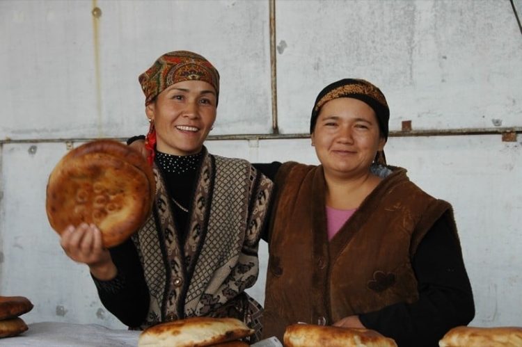Friendly bread vendors in Osh, Kyrgyzstan.