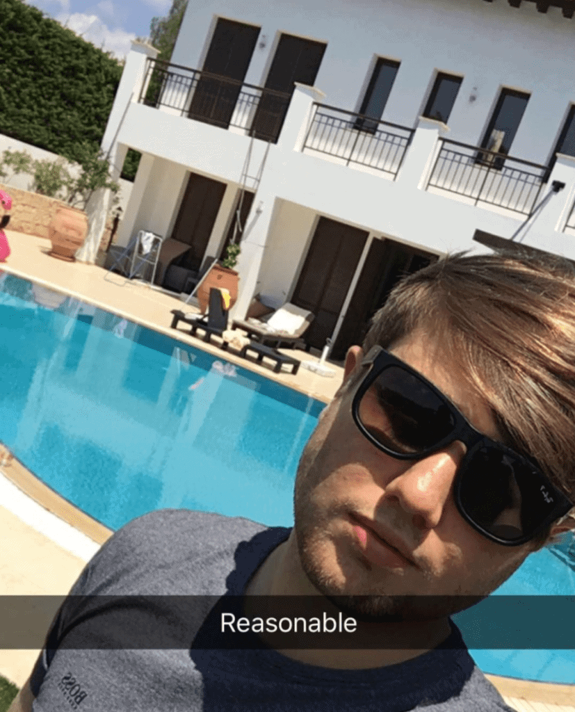 Luke Blackburn beside pool