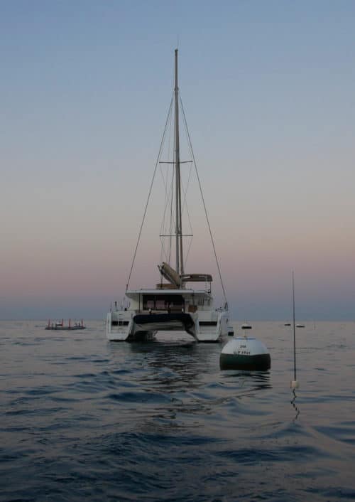 Leaving Helia 44 at mooring with moody sunset