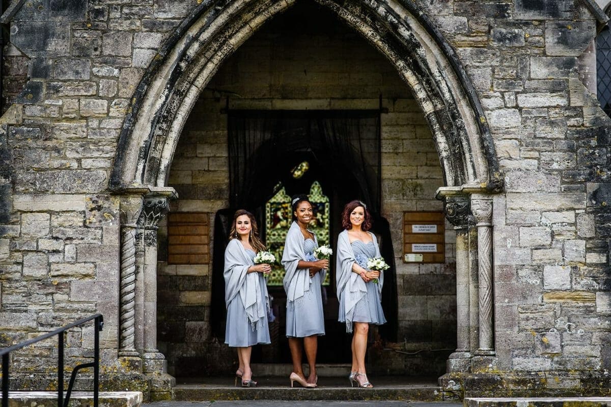 Bridesmaids wait for bride at St Edwards Church