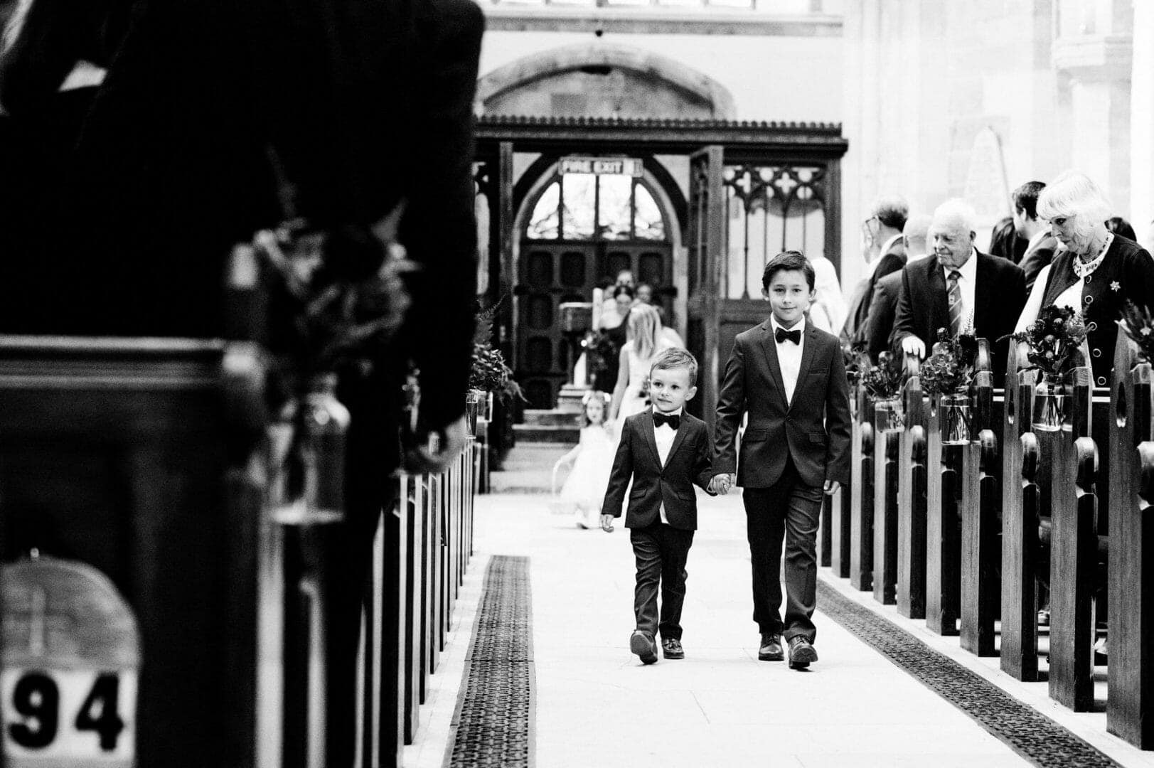 Page boys walk the aisle