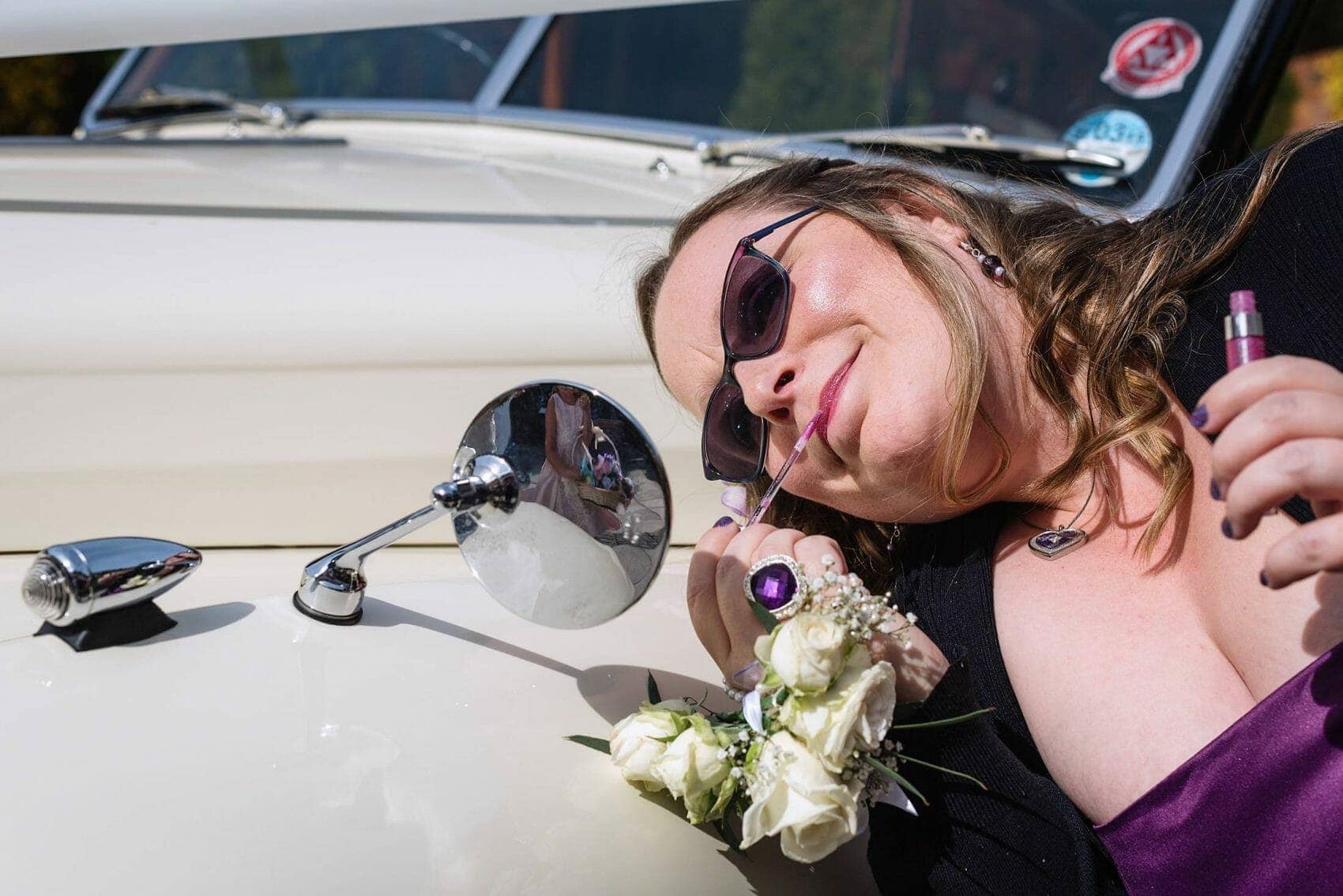 Bridesmaid chacking her makeup