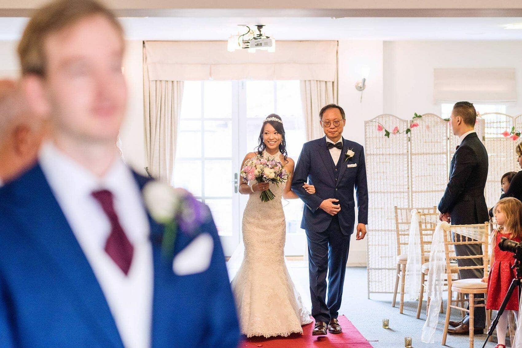 Bride walks the aisle at Compton Acres