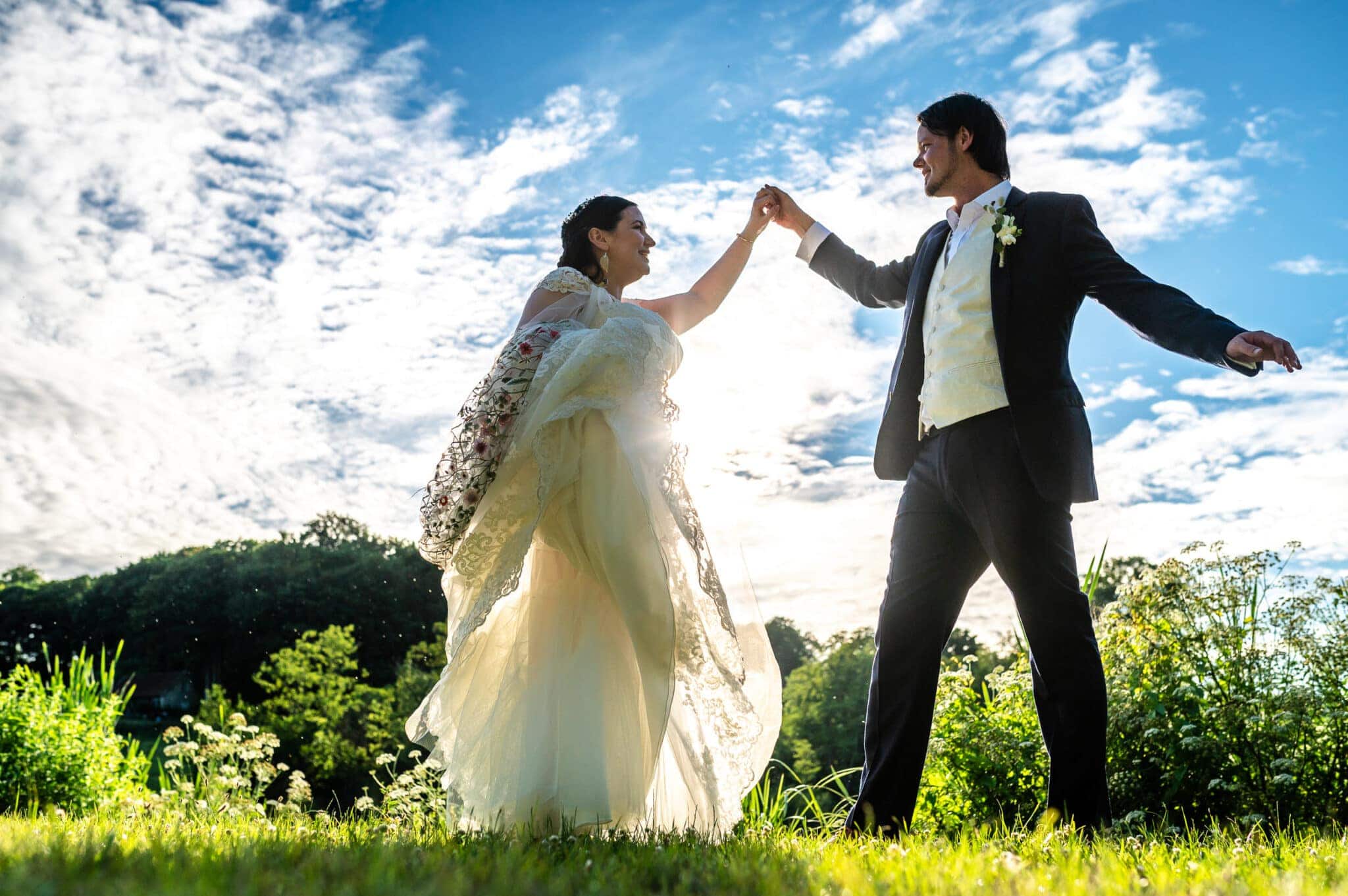 Dancing by the lake at Ashley Wood Farm wedding