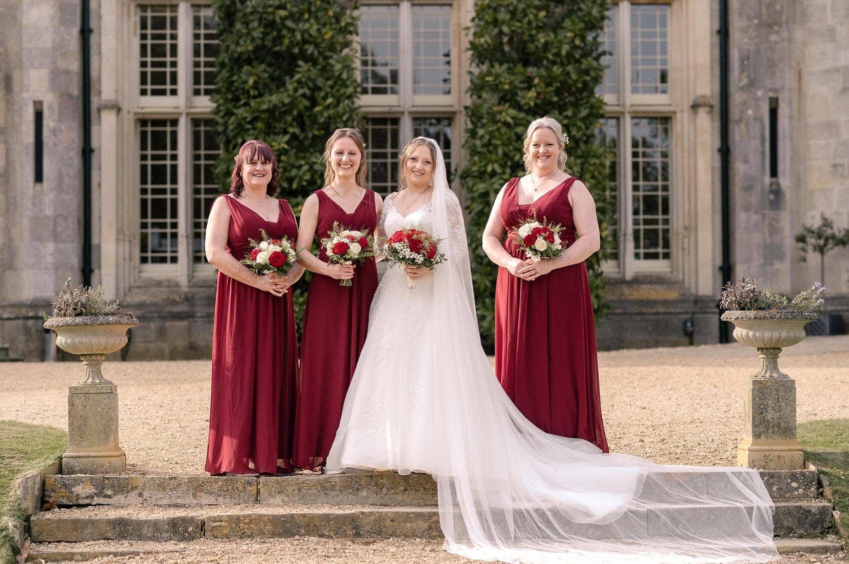 Bride with Bridesmaids in burgandy