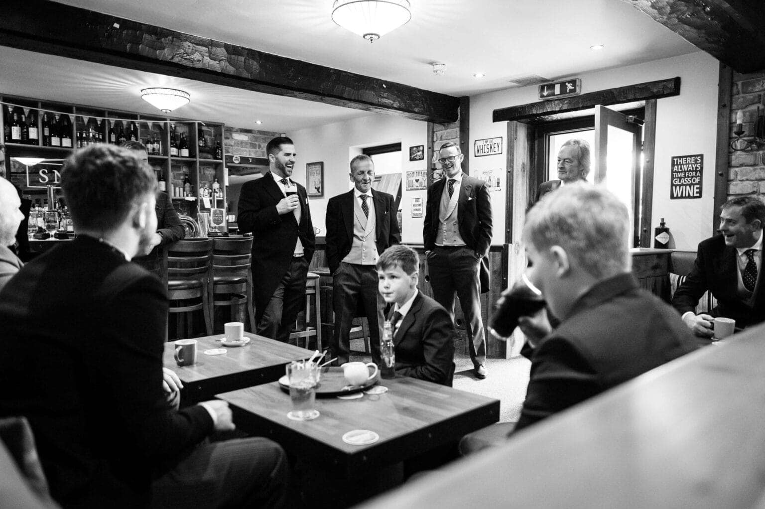 Groom having a pint at the Greyhound pub