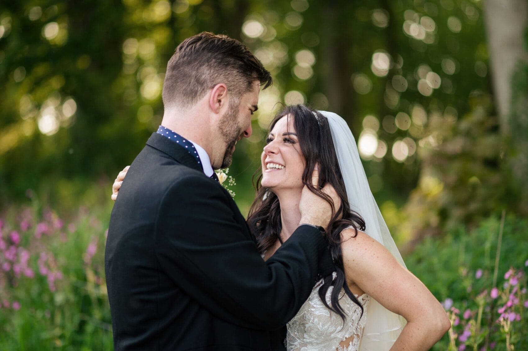 Bride and groom showing affection