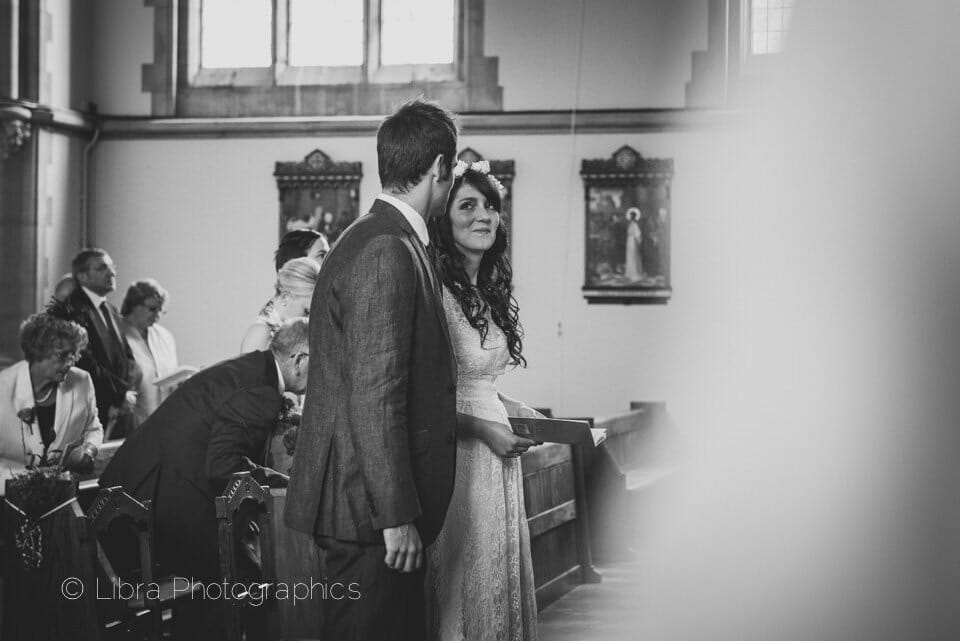 A happy gaze from a bride to her groom