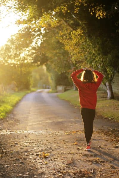 SAHM walking alone down a path