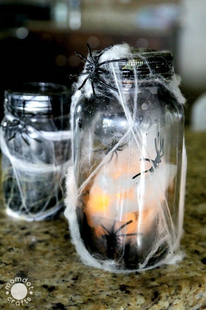 spooky mason jar with spider web