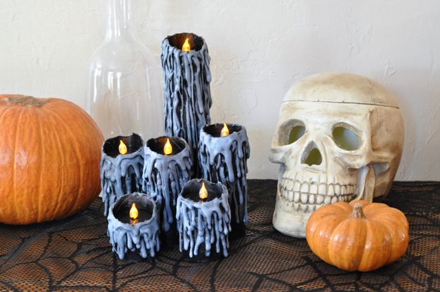 DIY halloween candles using recycled toilet paper rolls