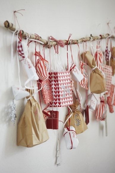 presents hanging from branch - DIY advent calendar