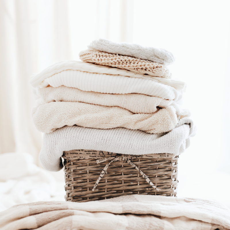 folded clothes in basket