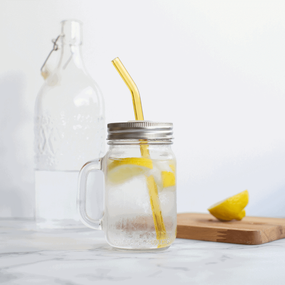 mason jar with glass straw inside 