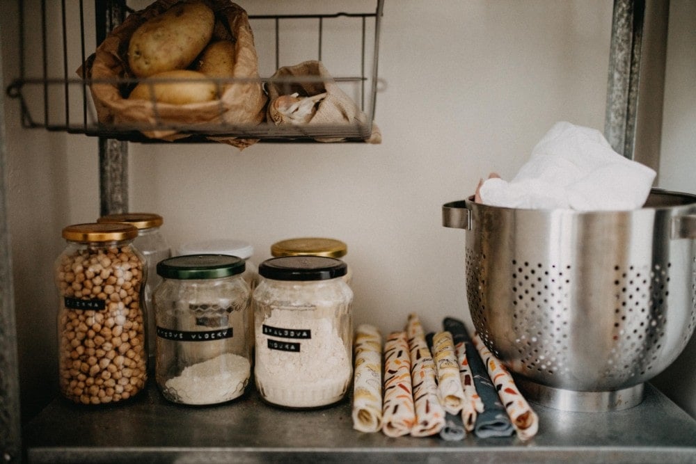 repurposed class jars on counter used for storage