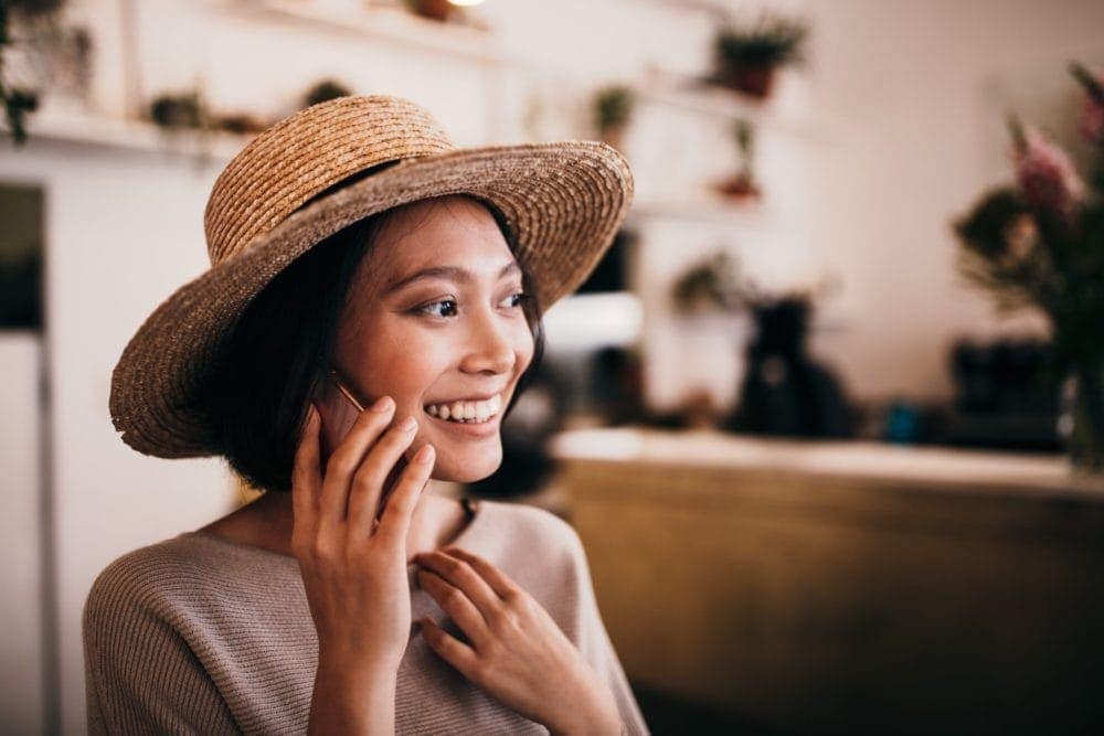 woman talking on phone having a conversation