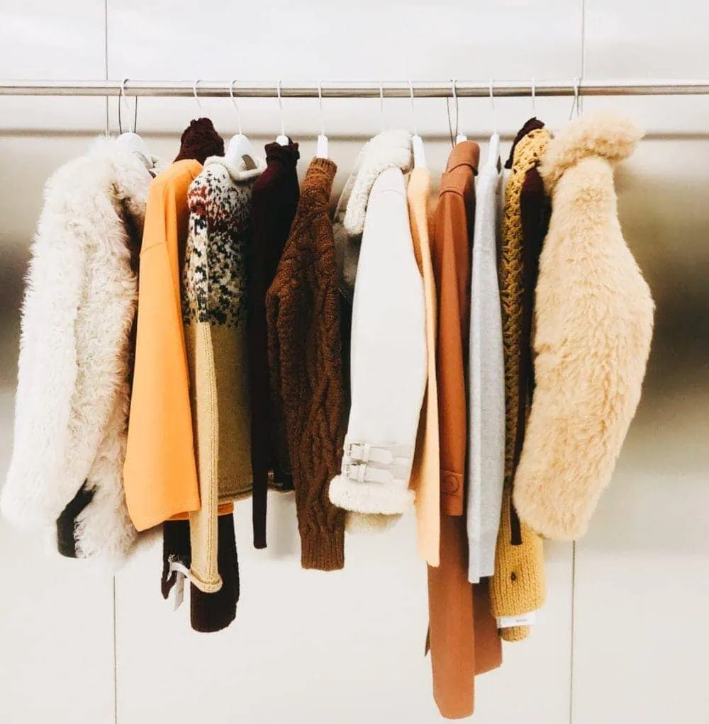 vintage clothing hanging on rack