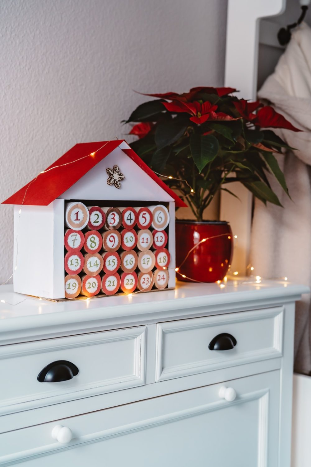 christmas advent calendar made with repurposed paper towel rolls