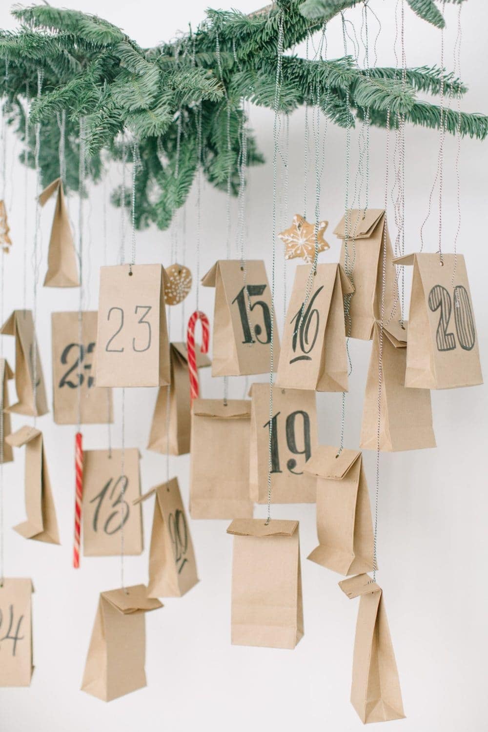 hanging DIY reusable christmas advent calendar made with paper bags and twine