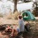 woman near tent on campsite