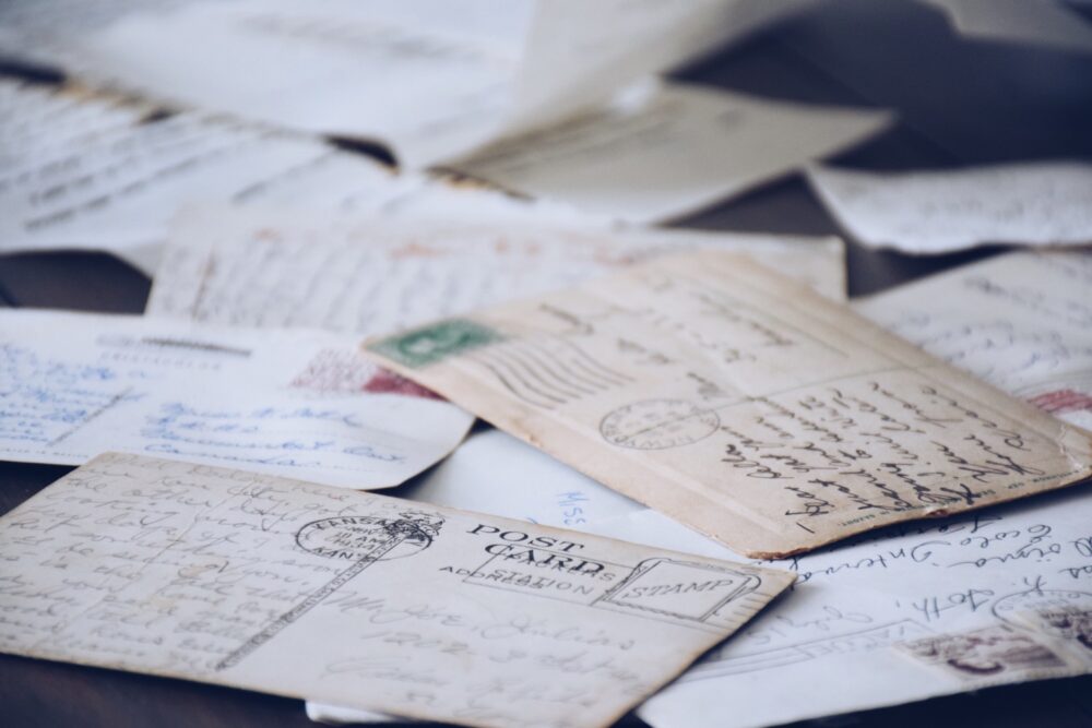 vintage post cards laid on table