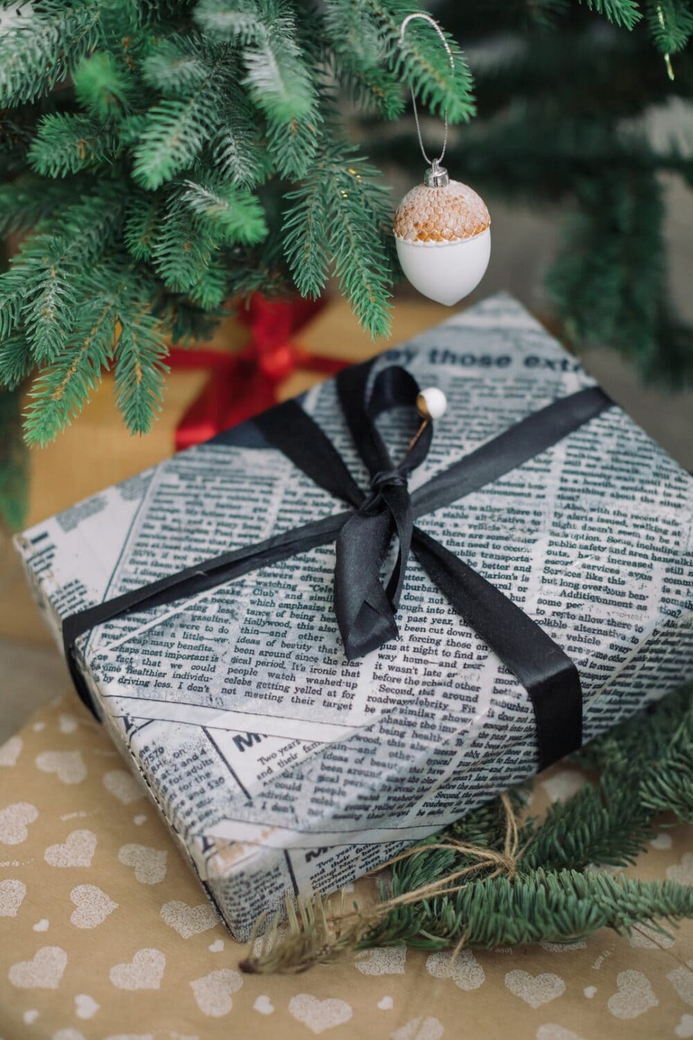 gift wrapped in newspaper with bow on top