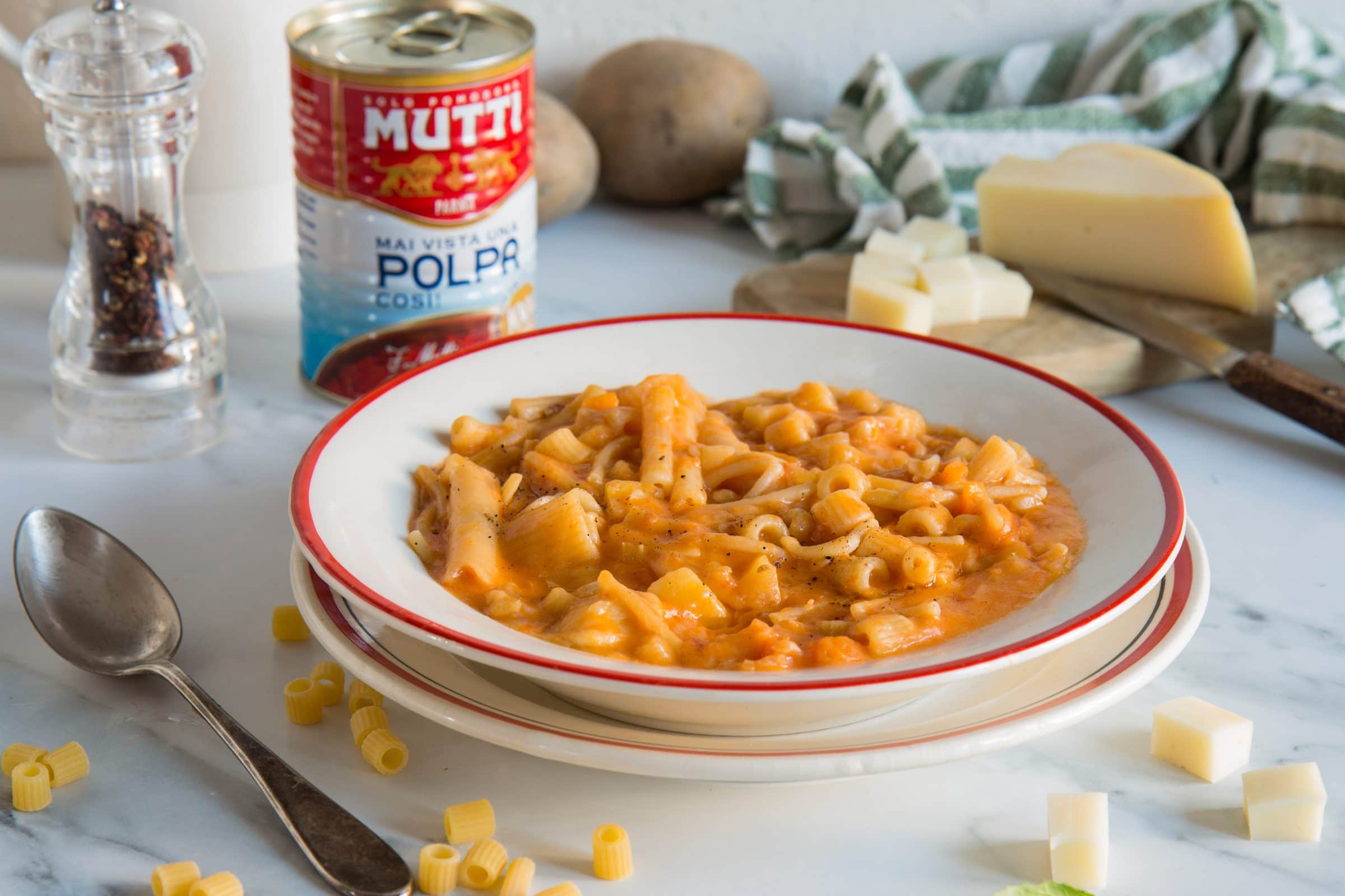 Pasta soup with potatoes and provola cheese