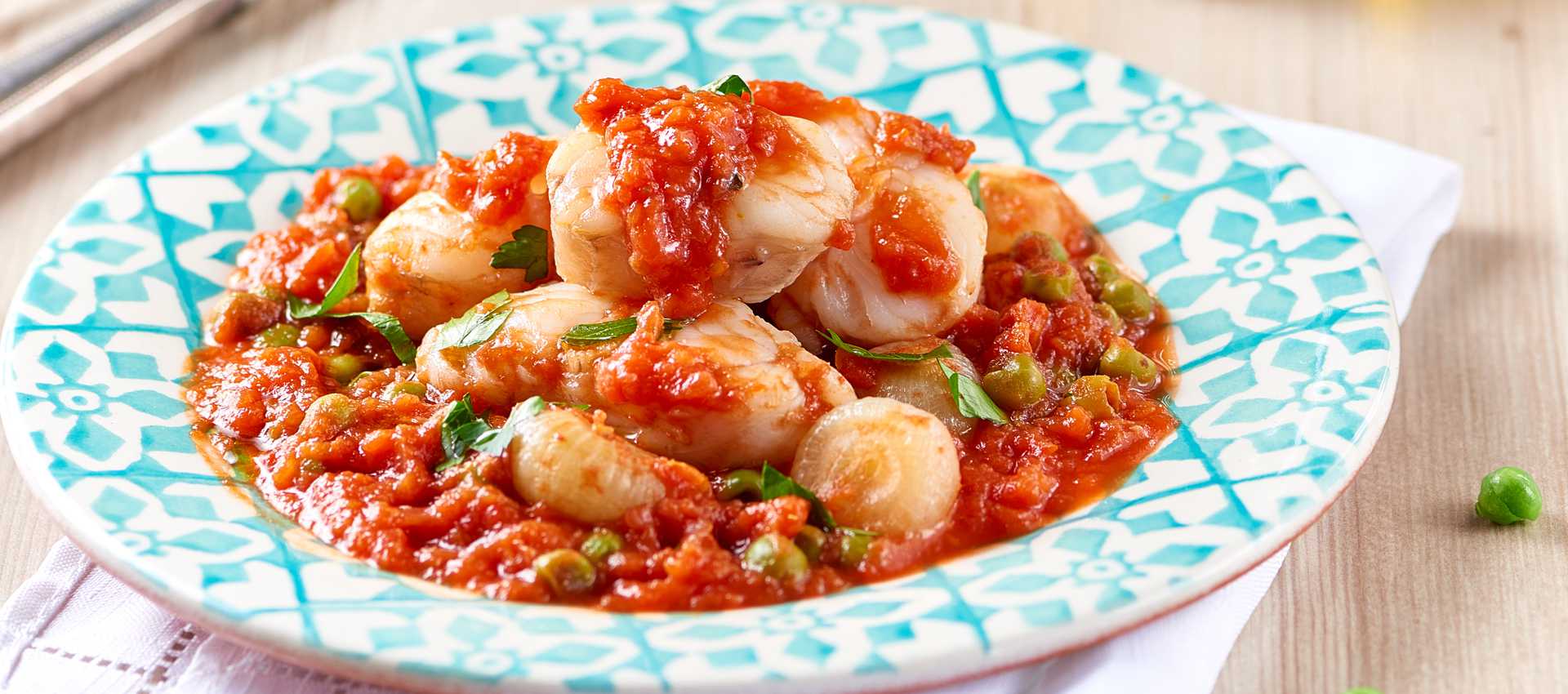 Fischragout mit perlzwiebeln und erbsen