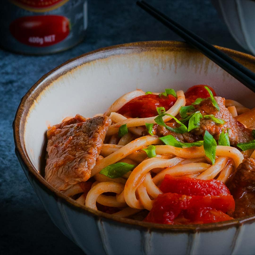 Sauté de bœuf à la tomate et nouilles chinoises