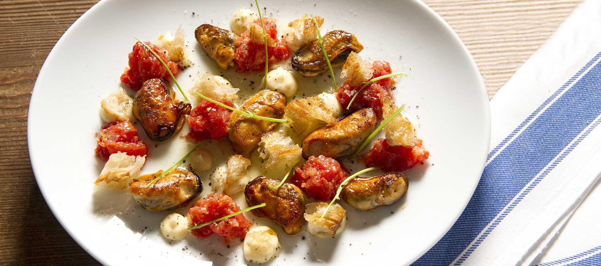 Moules frites aux tomates, au raifort et à la coriandre