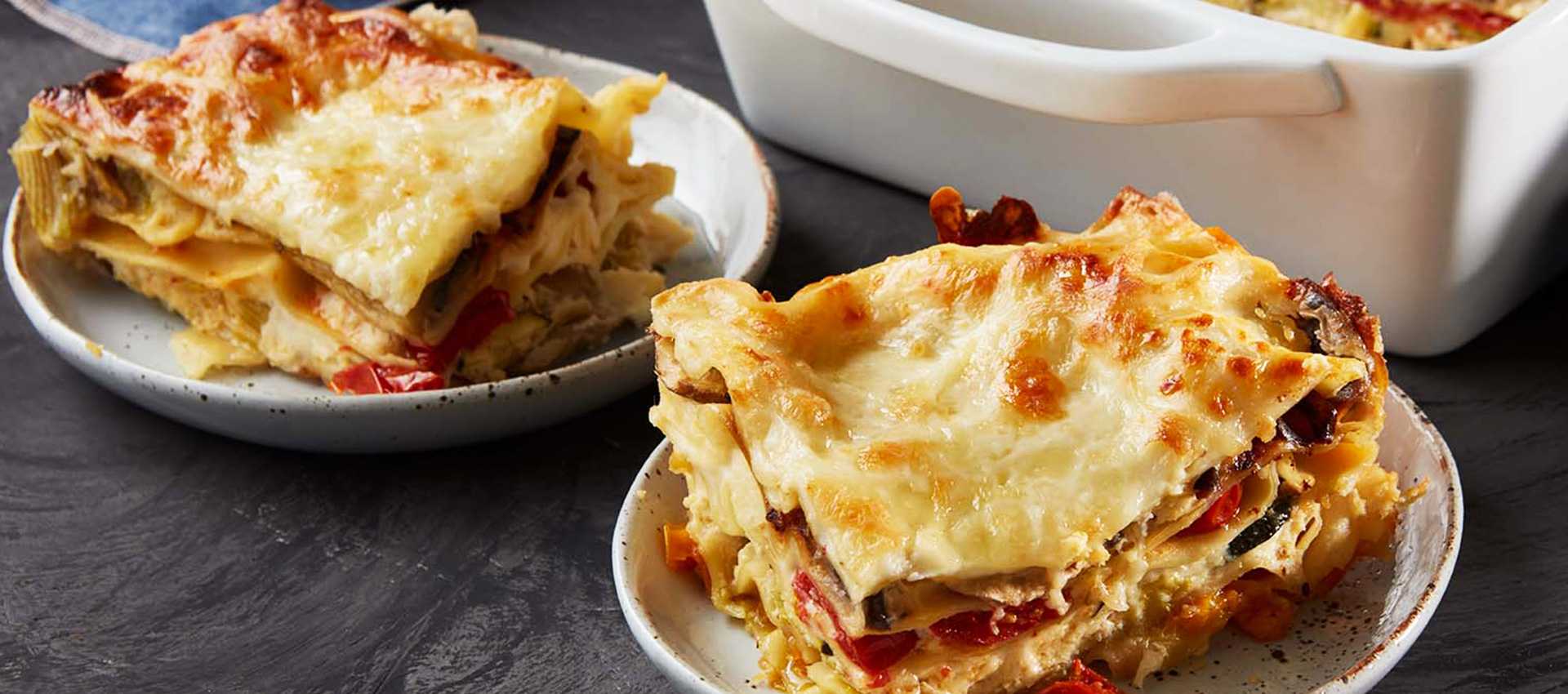 Roasted vegetable lasagna with cherry tomatoes