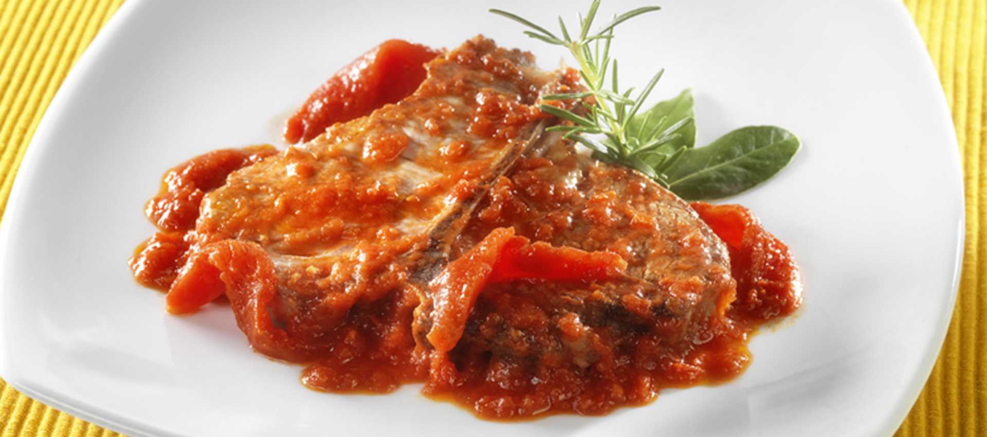 Pork chops in tomato sauce  with chopped tomatoes