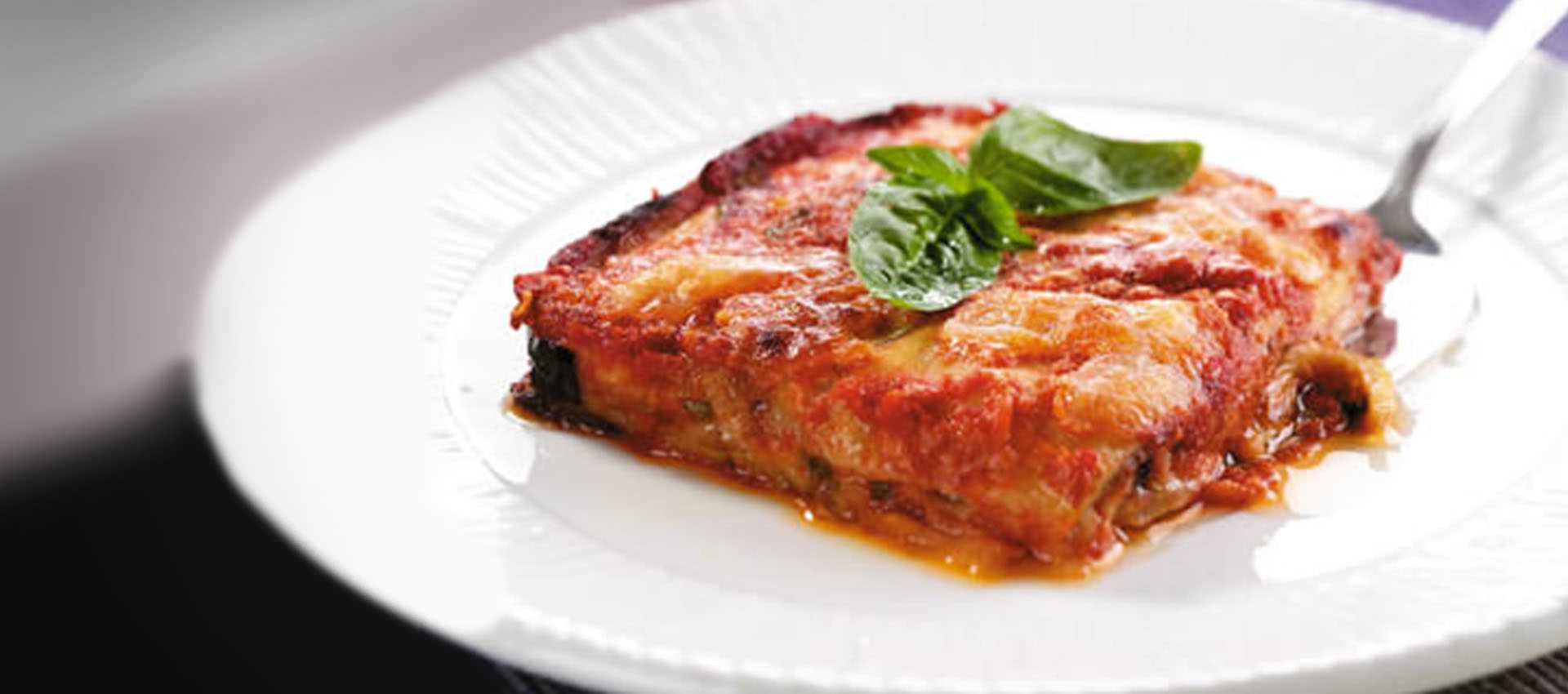 Aubergine parmigiana with tomato puree