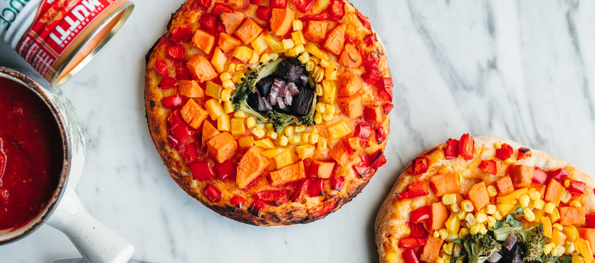 Rainbow pizza made with pizza sauce