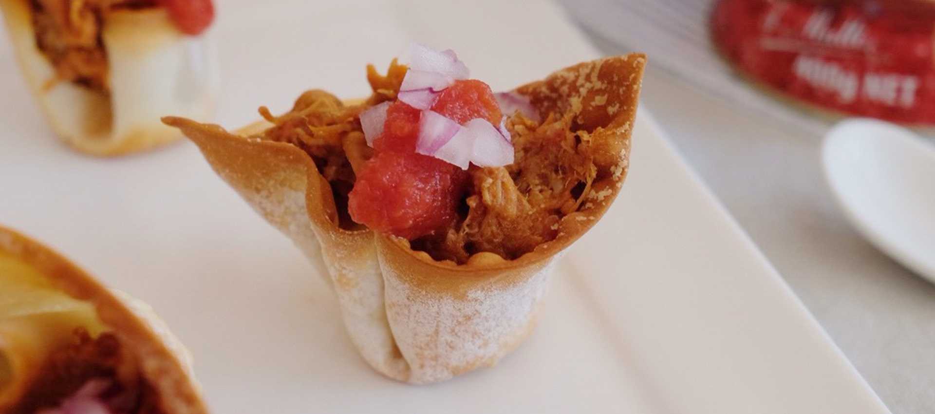 Pulled pork tortilla tartlets with chopped tomatoes