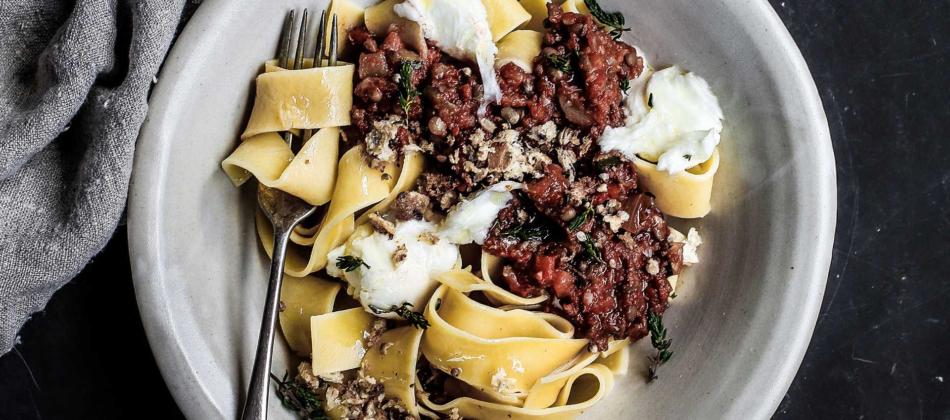 Lentil bolognese with burrata and pangrattato