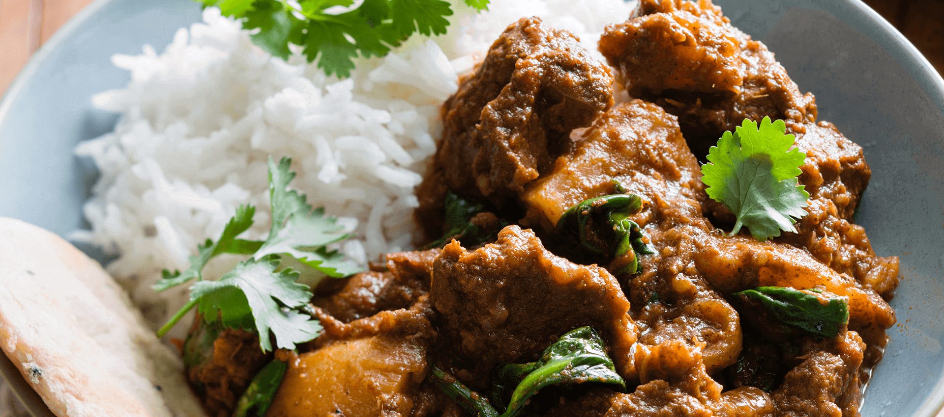 Beef madras and potato curry