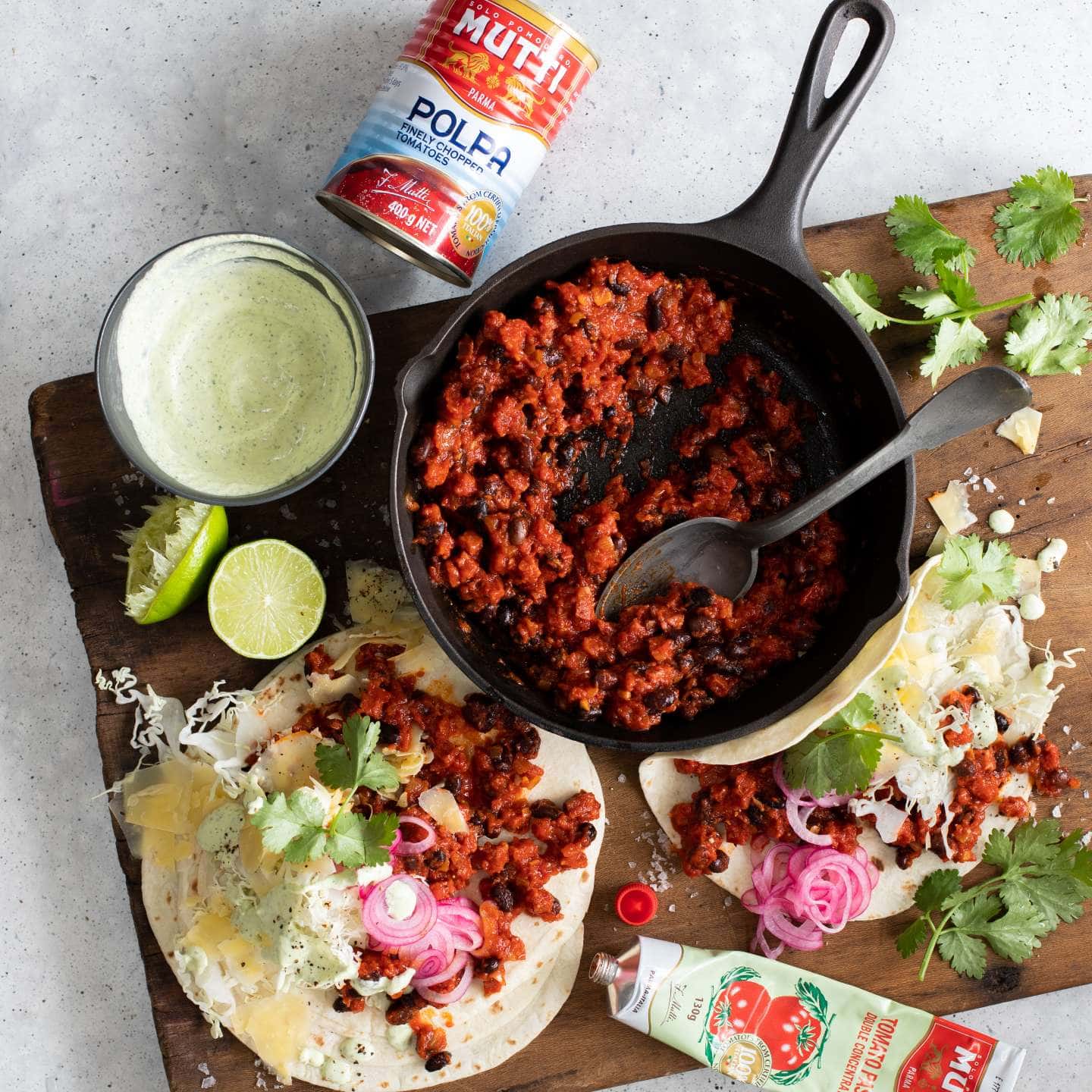Chorizo tomato and black bean tacos with sour cream