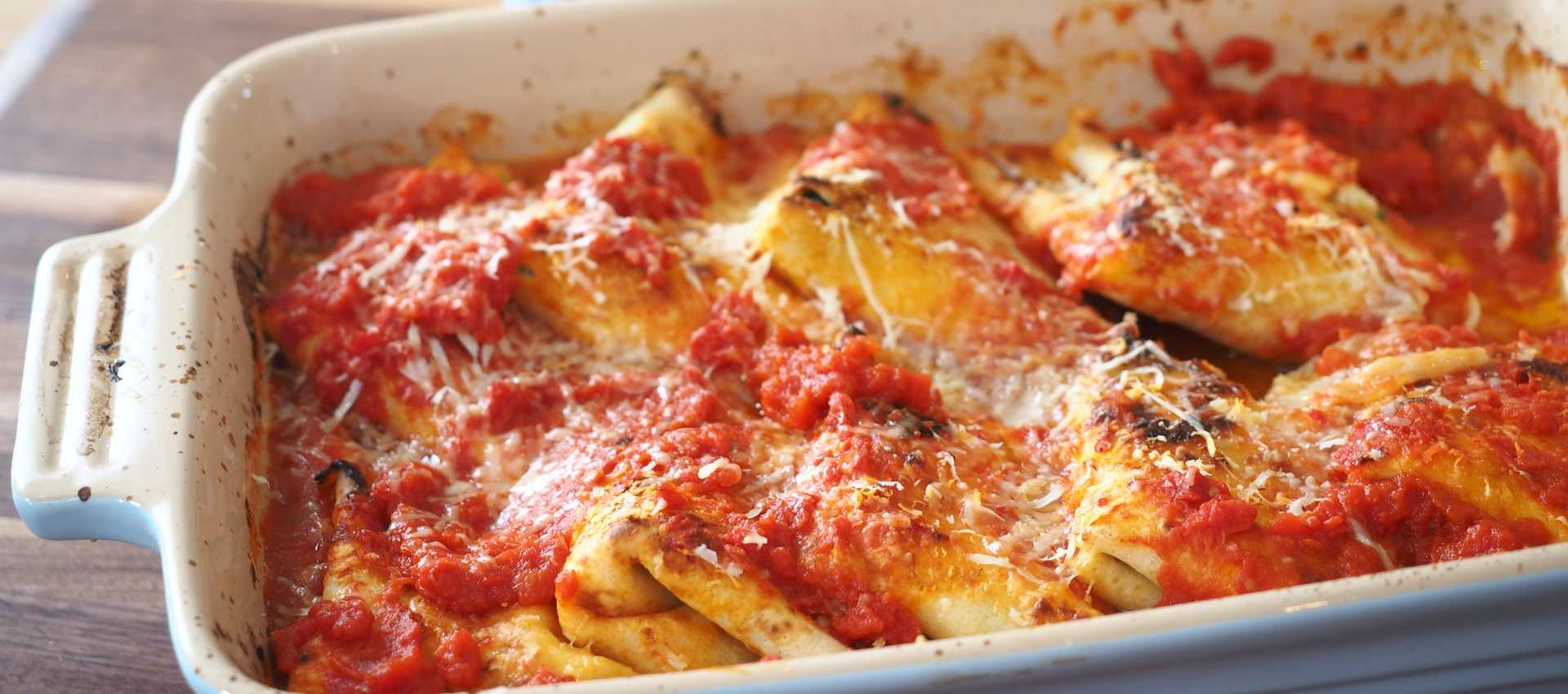 Crespelle with spinach, ricotta and chopped tomatoes